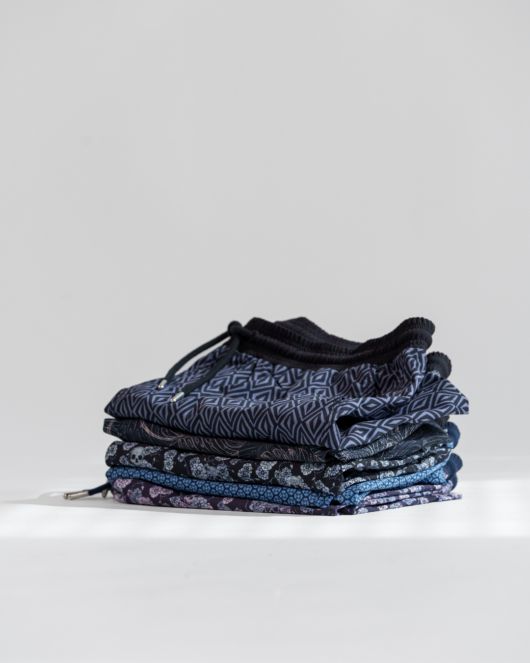 Branded product display with clean white background menswear