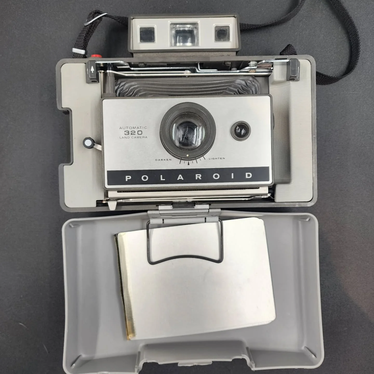 📷 For Sale: Polaroid Land Camera Automatic 320 (circa 1969&ndash;1971) This foldable instant camera comes with a flash attachment and carrying case.

Unlike modern instant cameras, this model required a bit more skill:
🔧 Manual focus using a zone-f