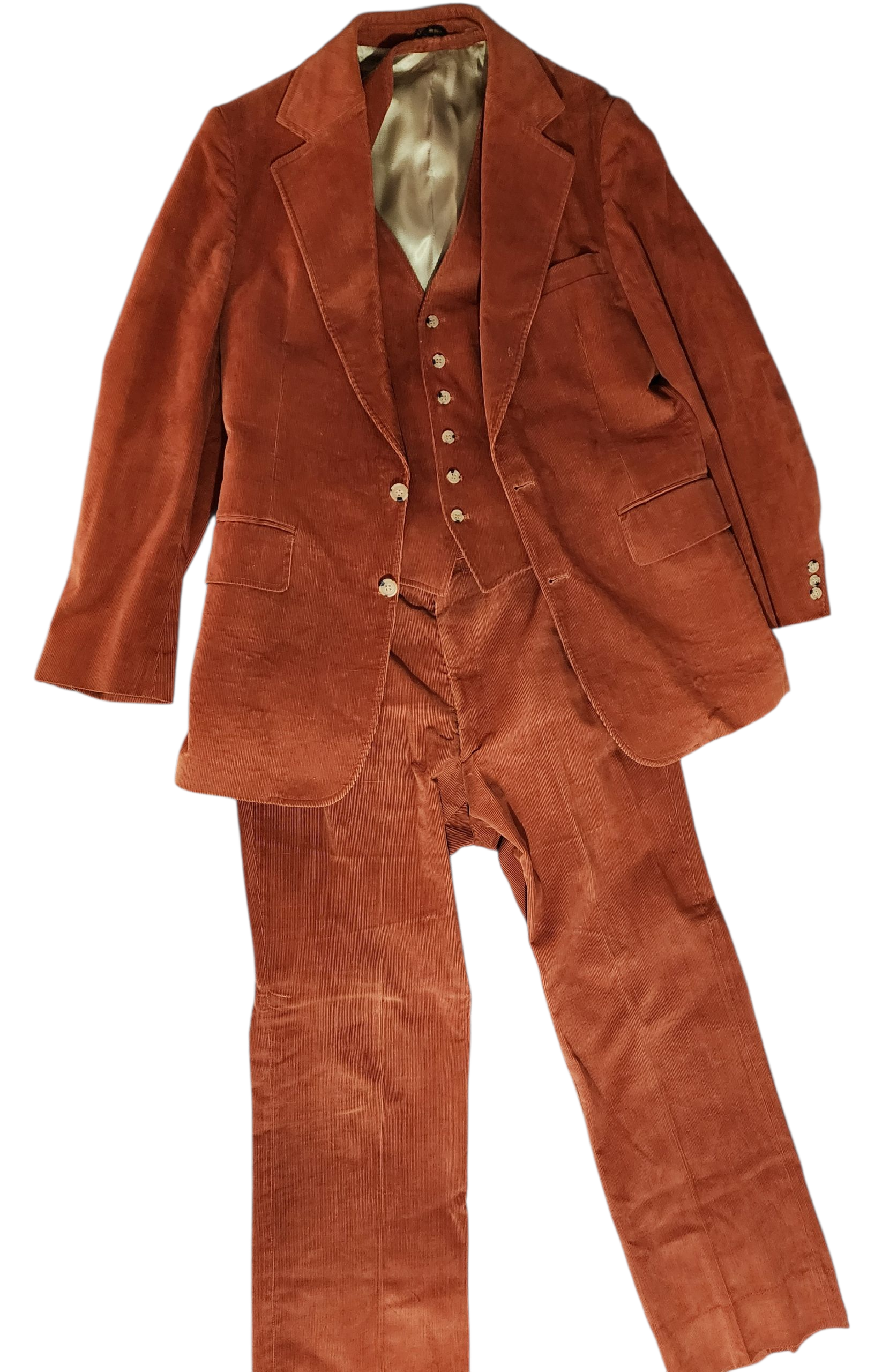 A rust-colored corduroy men's suit laid out flat, consisting of a blazer, vest, and trousers.