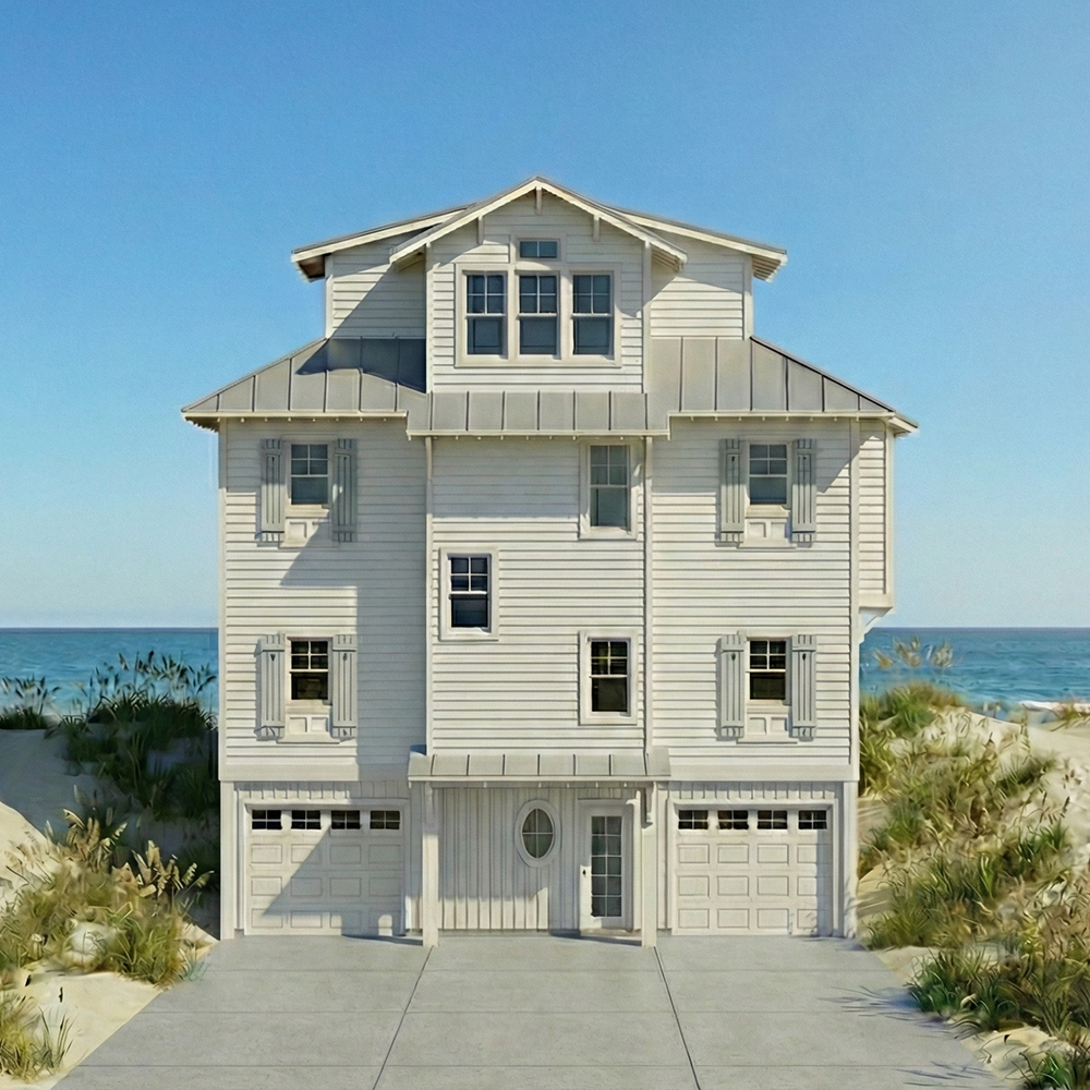 A white three-story beach house with a garage, situated on sandy dunes with vegetation, and the ocean in the background under a clear blue sky.