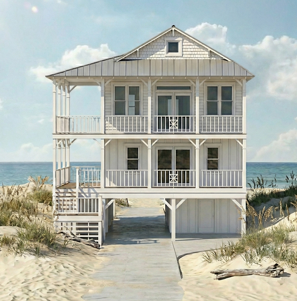 White multi-story beach house on sandy dunes with ocean and cloudy sky in background.