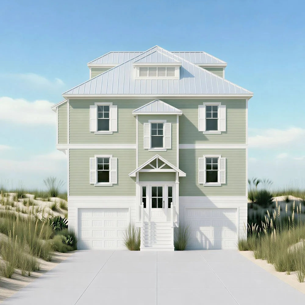 A three-story beach house with a metal roof, light green siding, white trim, and a front porch with stairs leading to the main door. The house is surrounded by sand dunes and beach grass under a blue sky.
