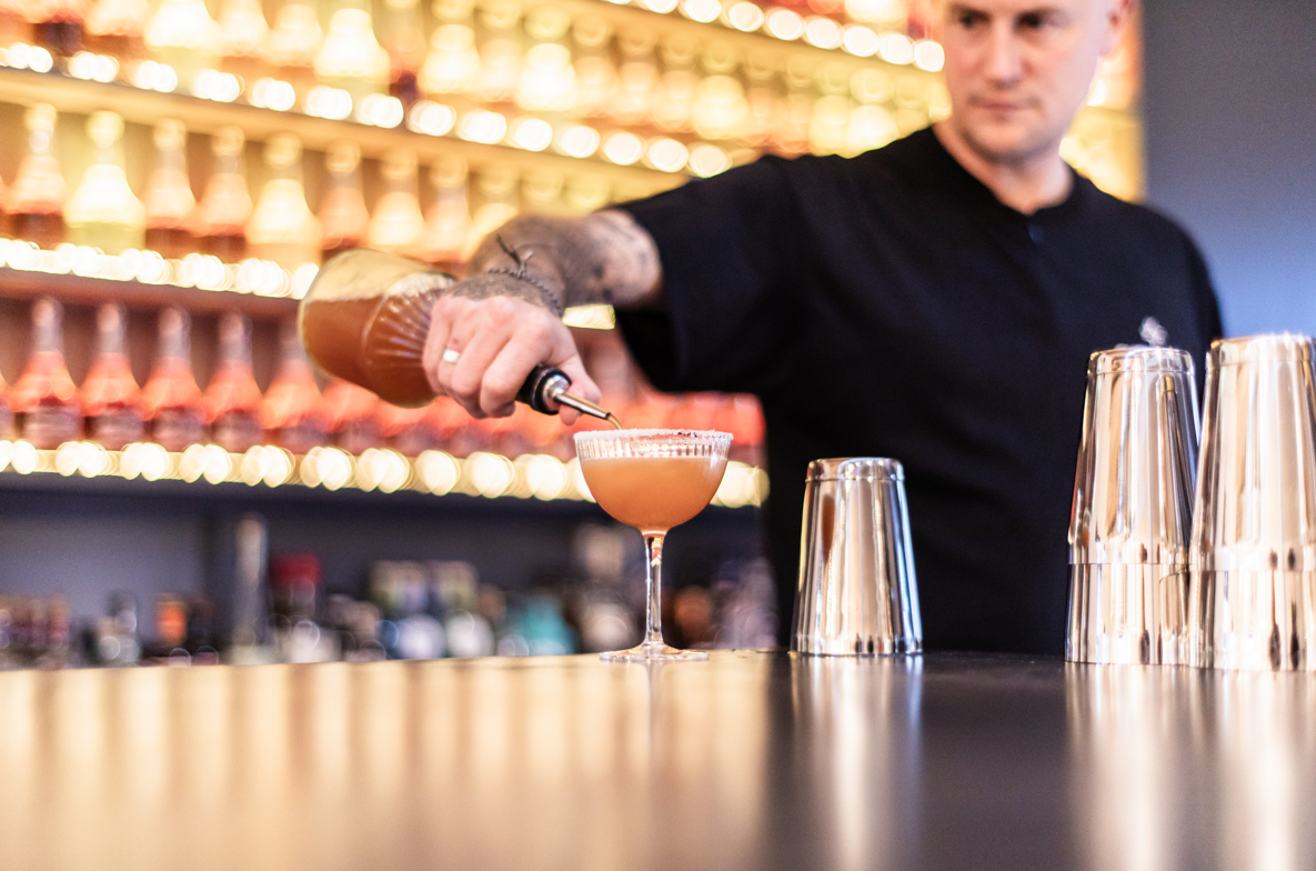 The-Brandy-House-Bar-at-Burnt-Faith-cocktail-pouring-landscape-low-res.webp