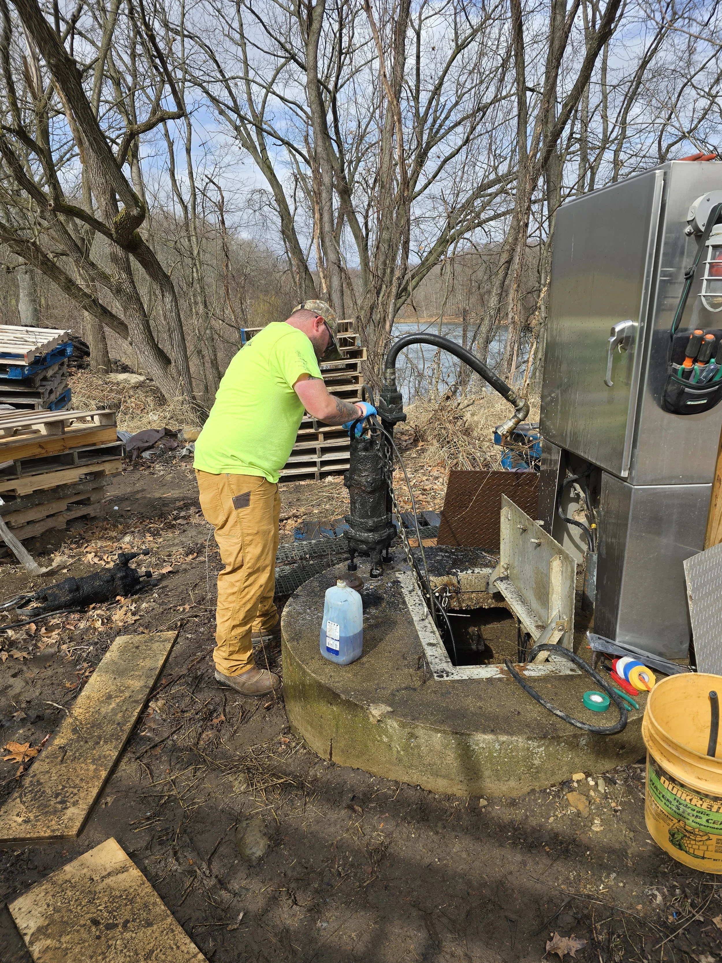 ASI commercial division service professional performing commercial maintenance on a pump