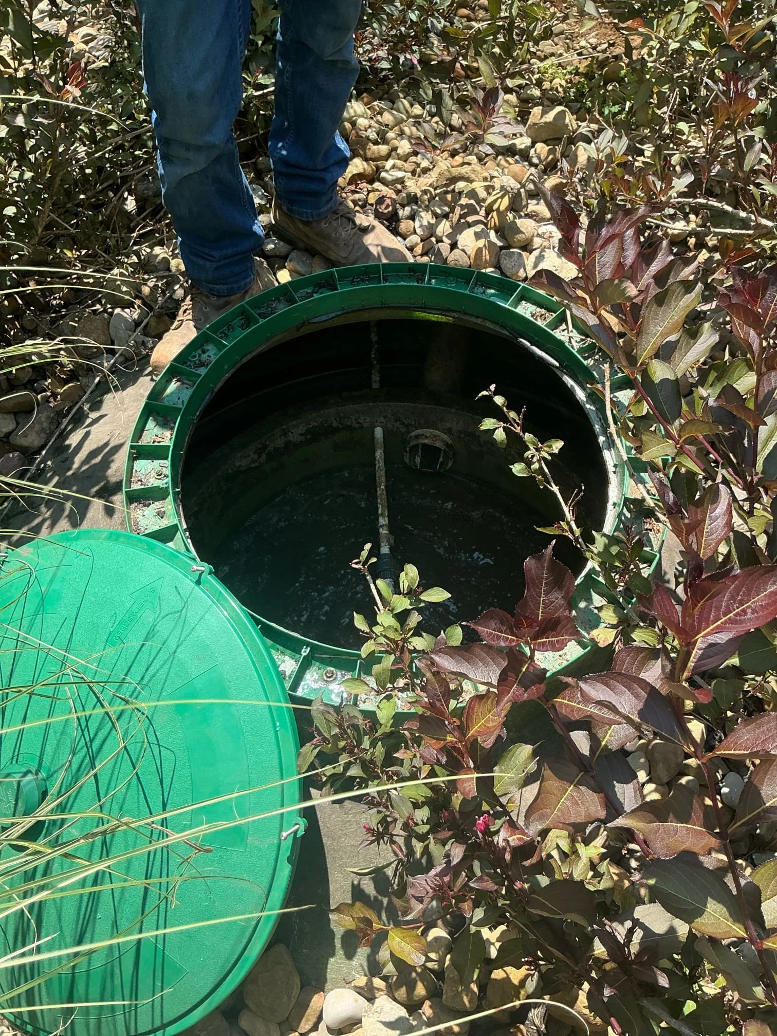 ASI service professional servicing septic system