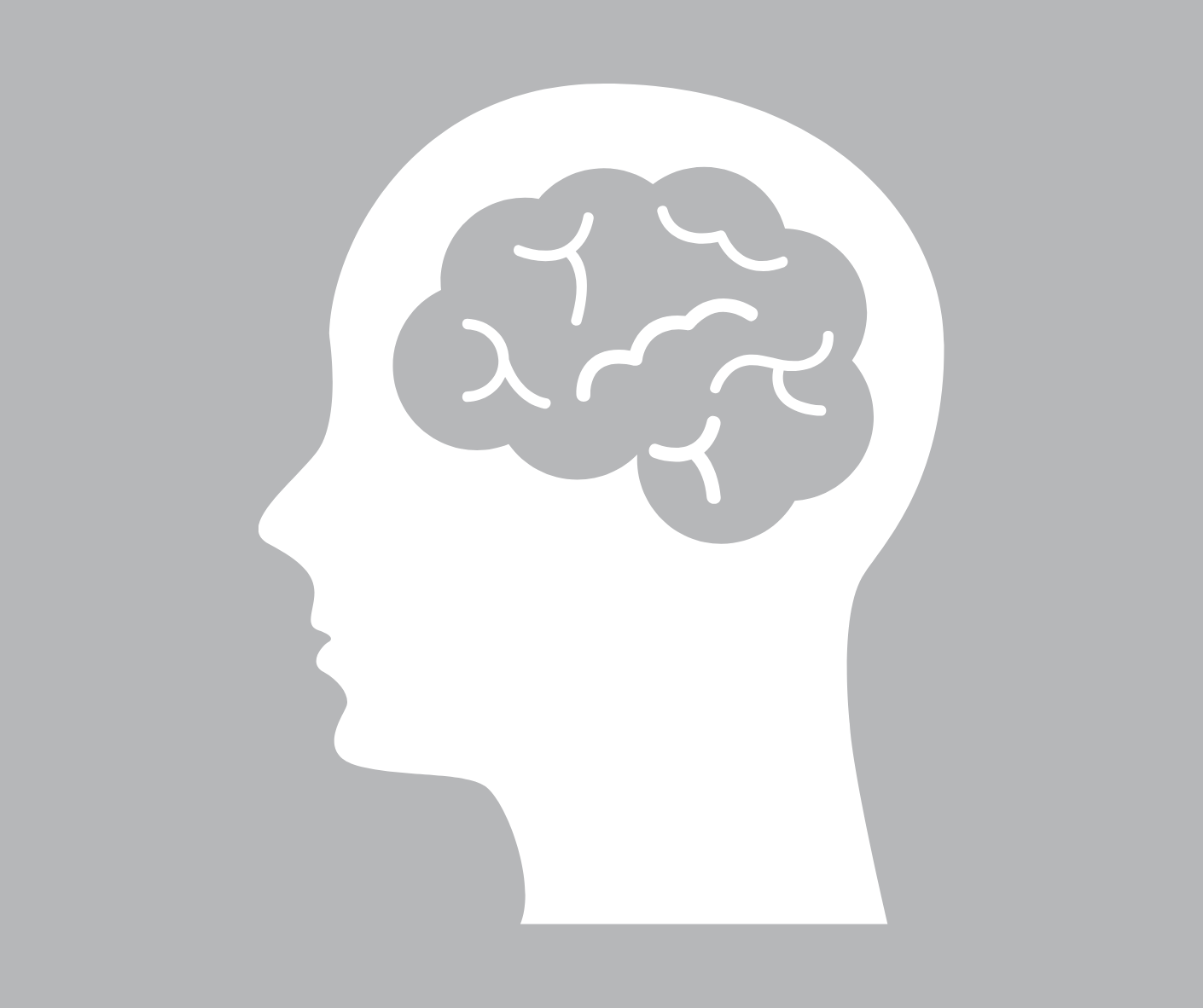 Profile silhouette of a human head with a brain illustration inside.