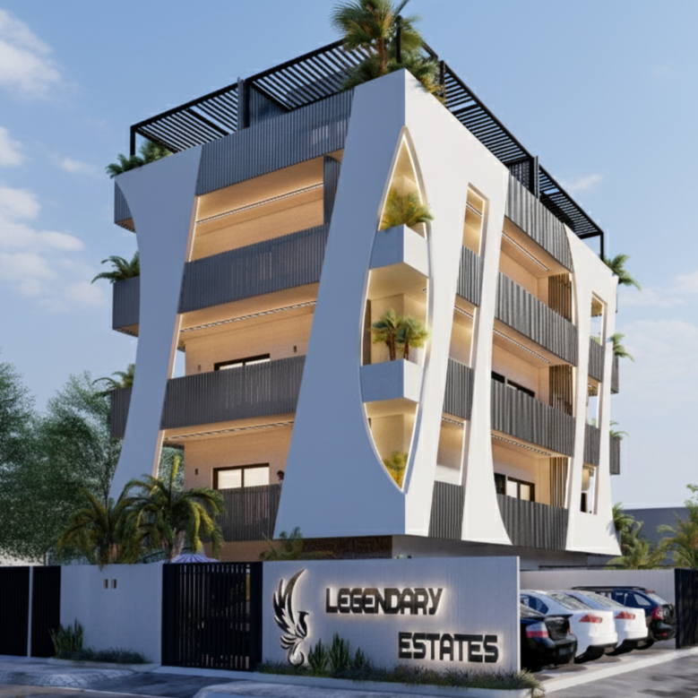 Modern multi-story residential building with large open balconies and decorative curved white panels featuring cutouts, surrounded by palm trees. The building has a sign that reads 'Legendary Estates' at the entrance.