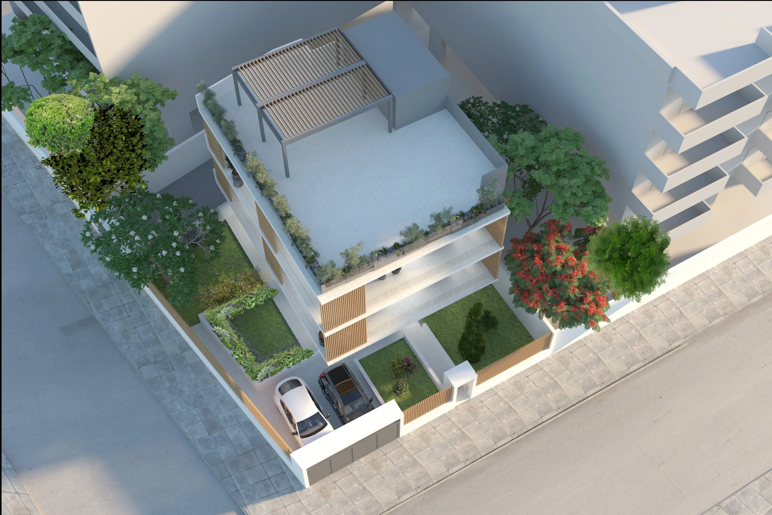Aerial view of a modern residential building with a rooftop terrace, greenery, and parking spaces.