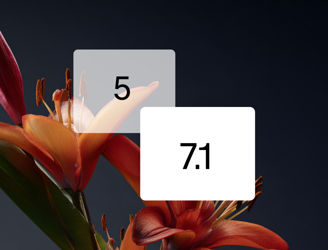 Close-up of an orange and red lily flower with two overlayed boxes displaying the numbers 5 and 7.1.