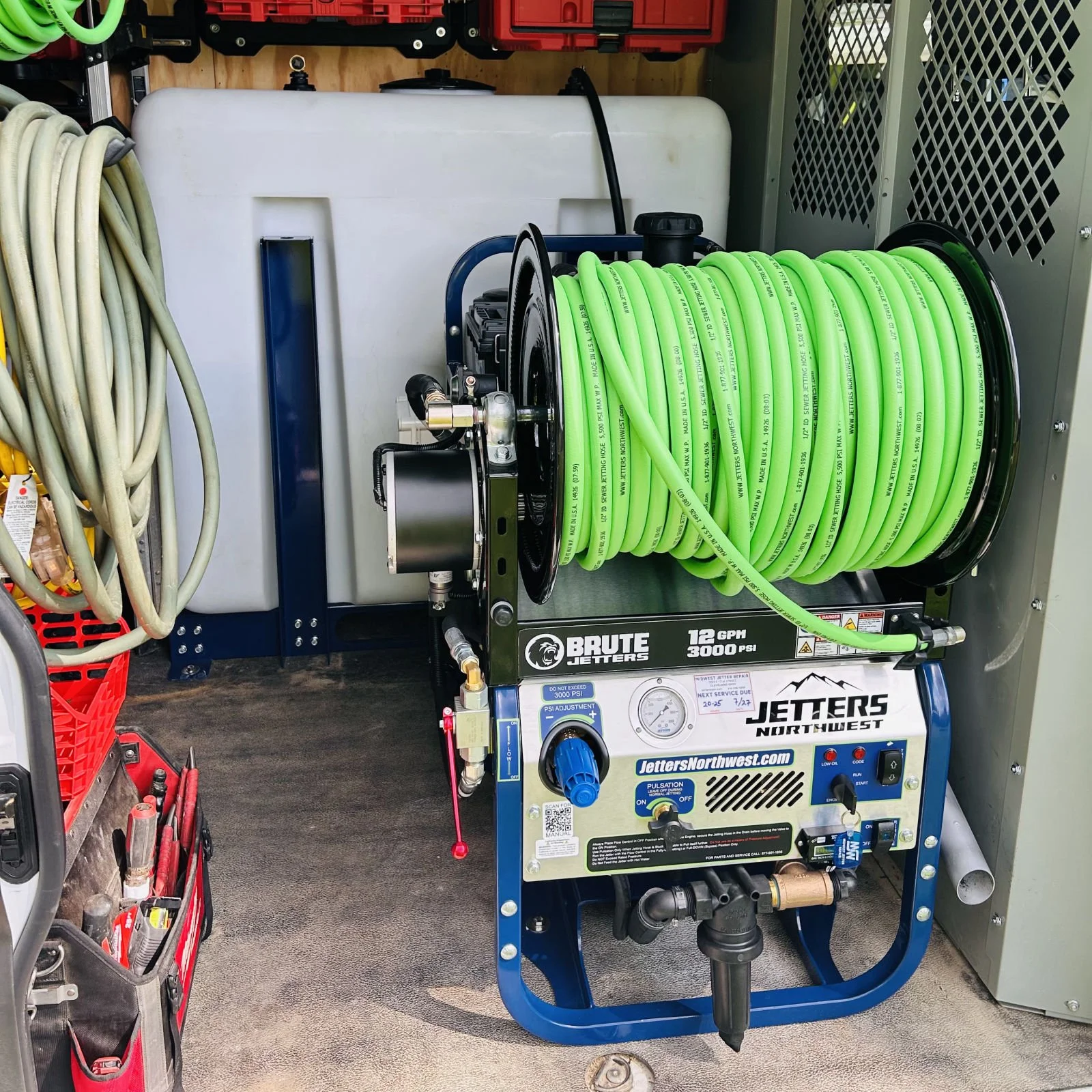 Hydro jetter with hose reel mounted in a Pipefather service van