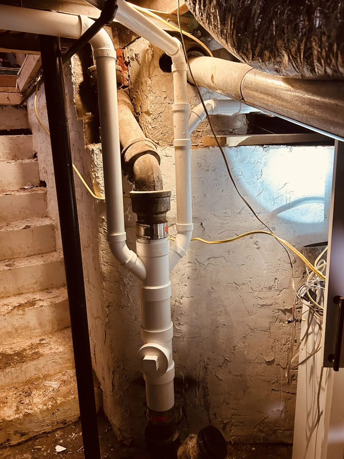 Basement drain stack replaced with new PVC and a cleanout