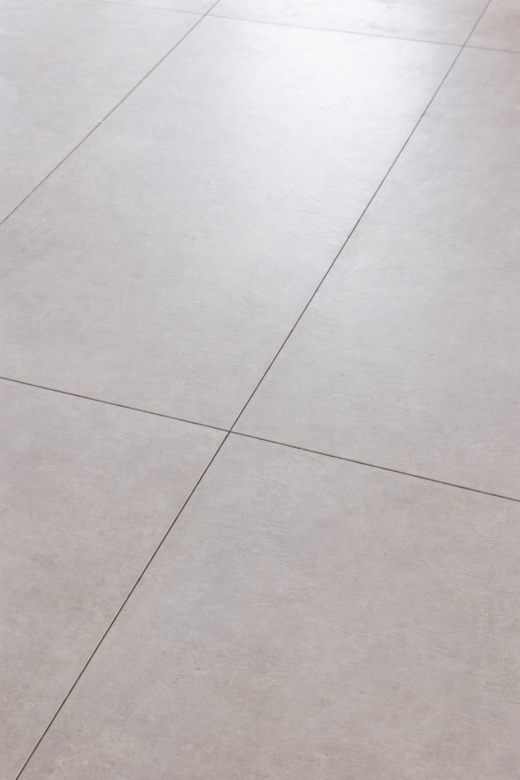 A refined concrete floor sets a calm, modern base—designed to ground the space while letting every detail above it shine.