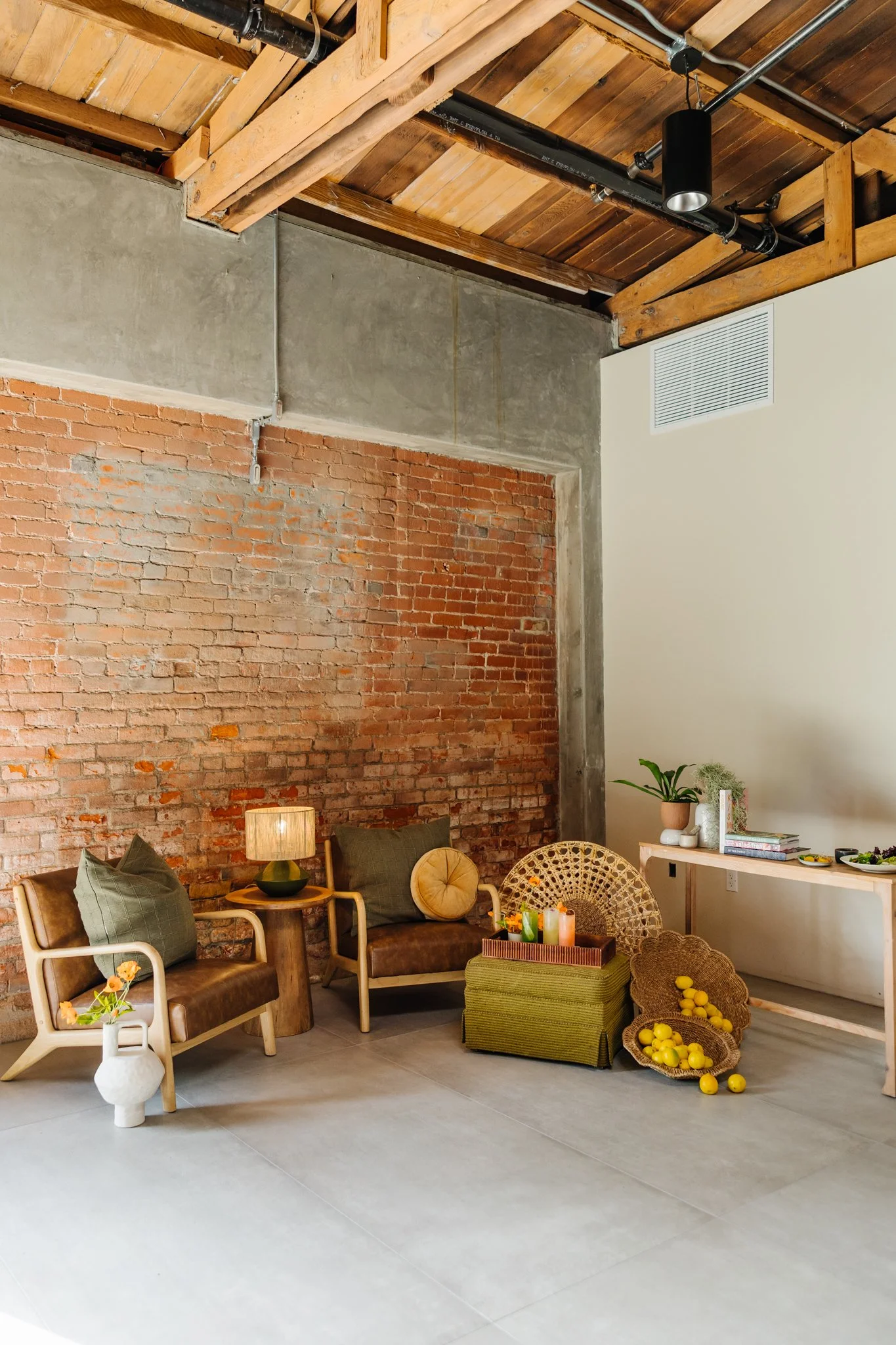 Indoor event space at Palomino in downtown Ventura with brick walls and refined gathering atmosphere.