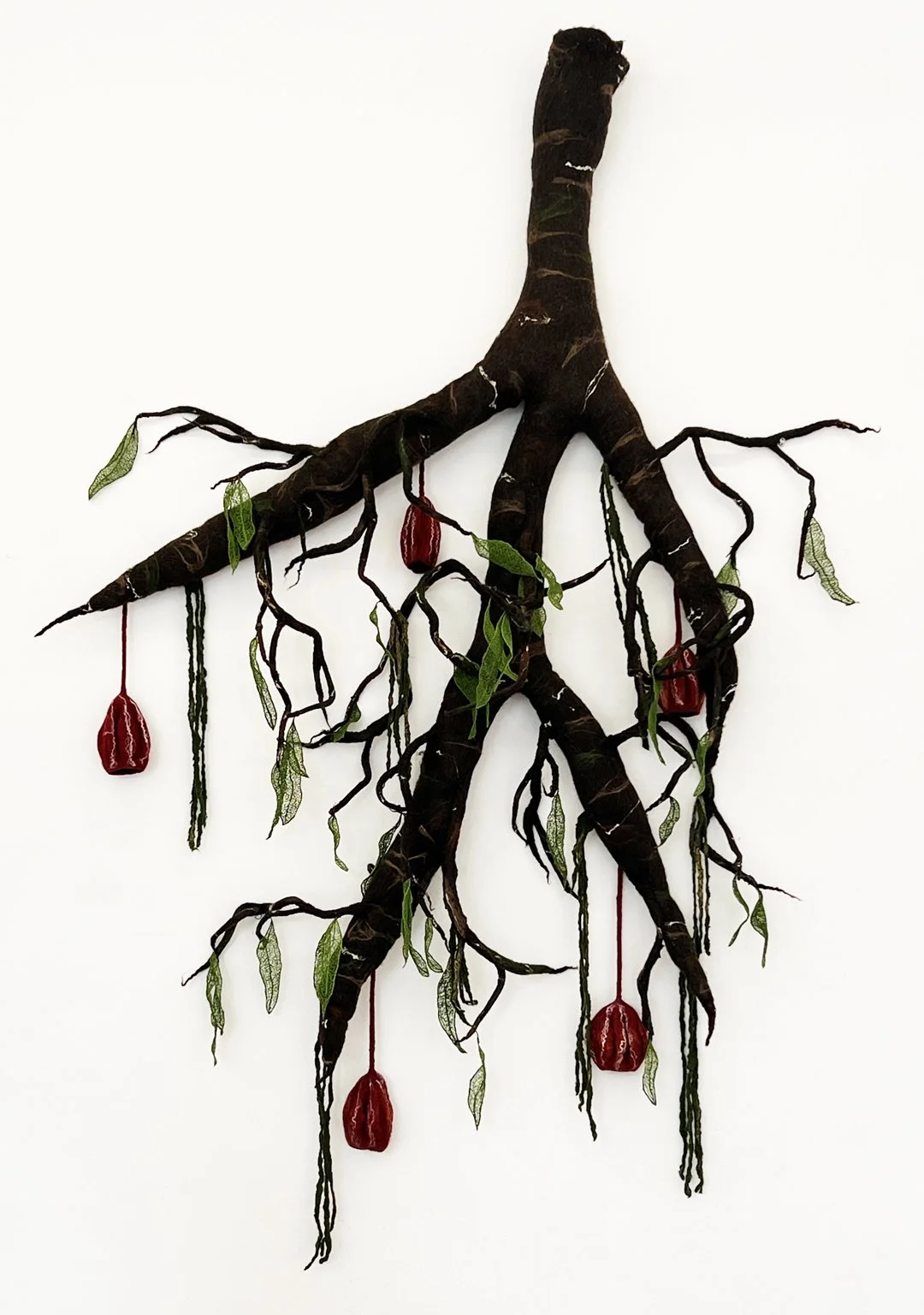 "Denizen of the Forest"  2025  (62 x 45 x 15") wool roving, embroidery thread, silk noil