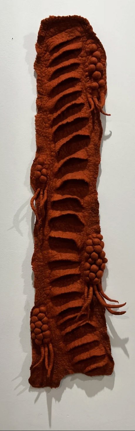 "Breathing" 2022, wool roving (35 x 8 x 3")