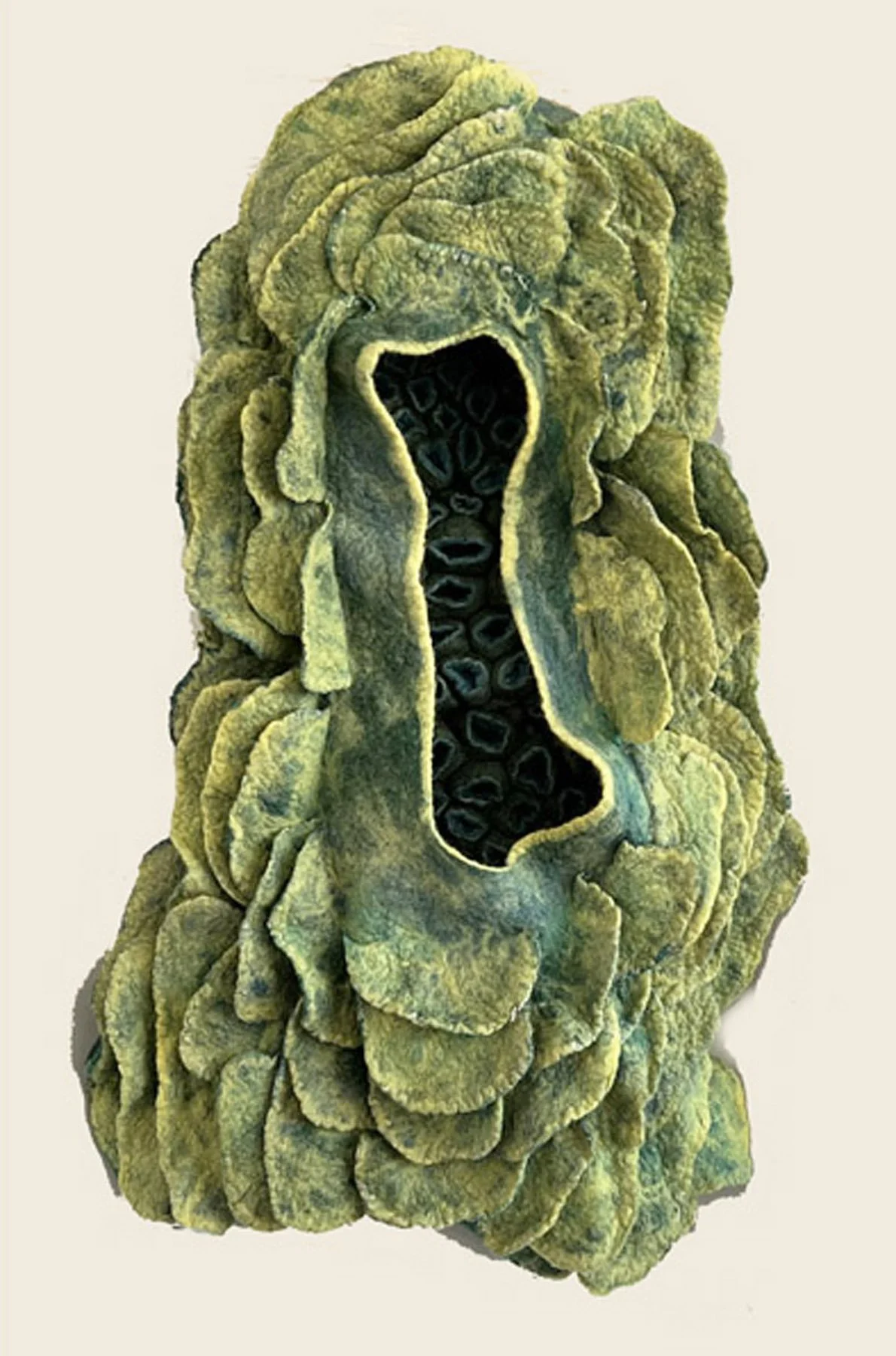 "Hidden Comfort" 2023, wool roving (32 x 19 x 7")