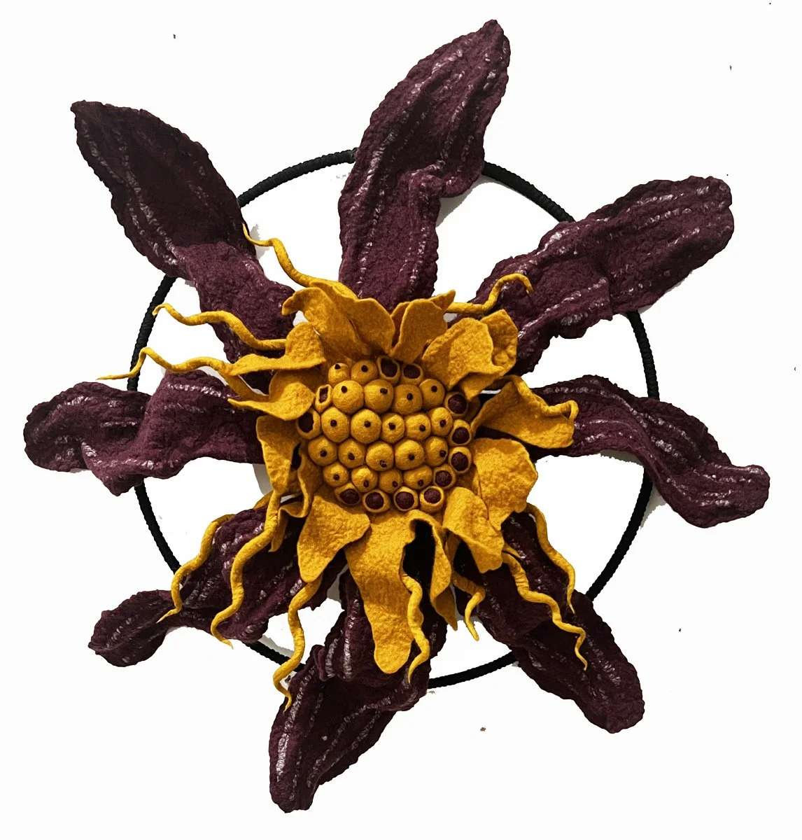 "Dahlia 1" 2024, wool roving, macrame cord, metal hoop (21 x 17 x 5")