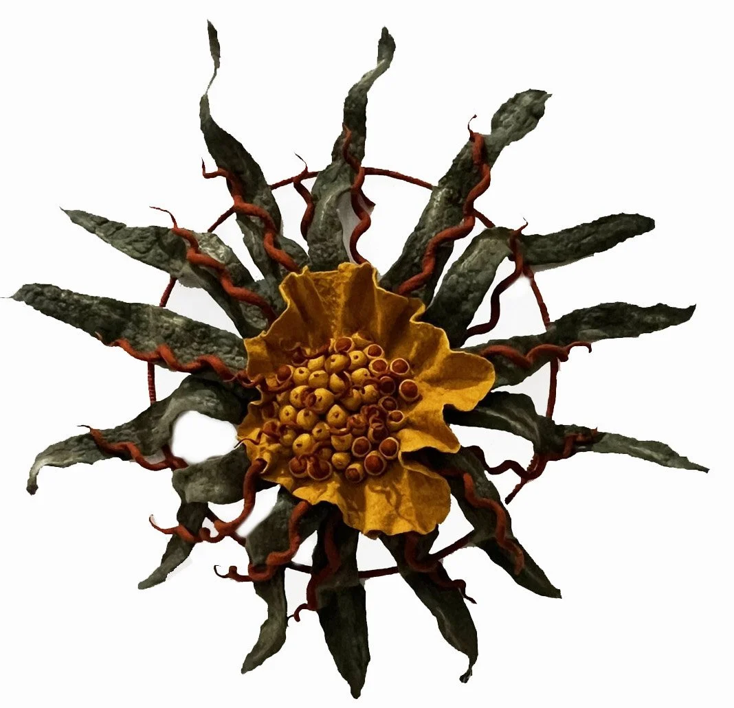 "Dahlia 2" 2023, wool roving, macrame cord, metal hoop (25 x 25 x 6")