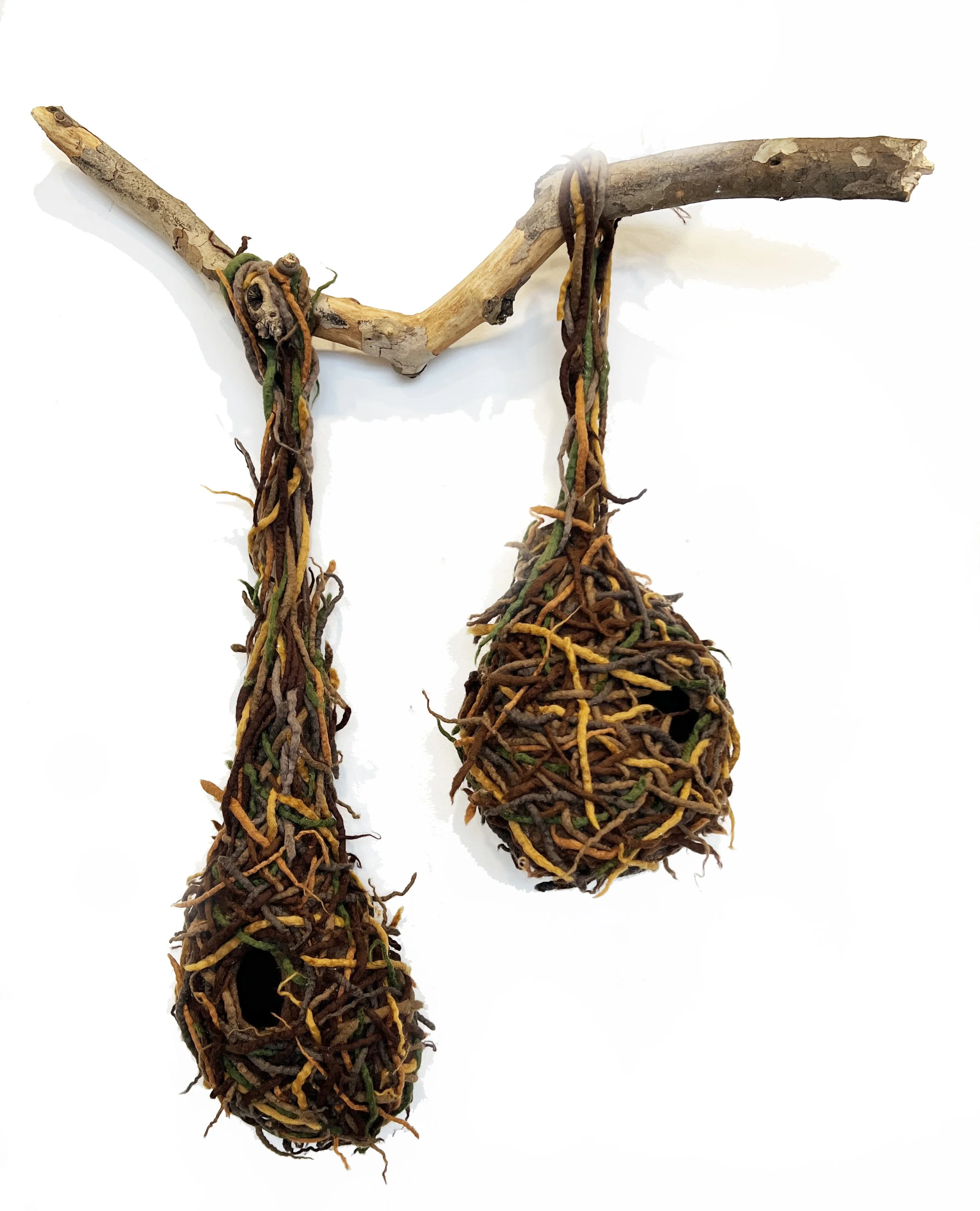 "Weaver's Nest 3" 2025, wool roving, tree branch (28 x 22 x 6")