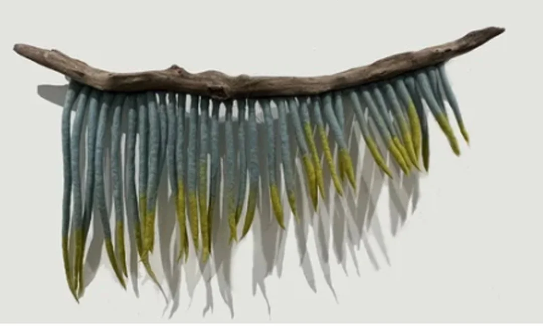 "Spanish Moss"  2022, wool roving, tree branch  (13 x 23 x 3")