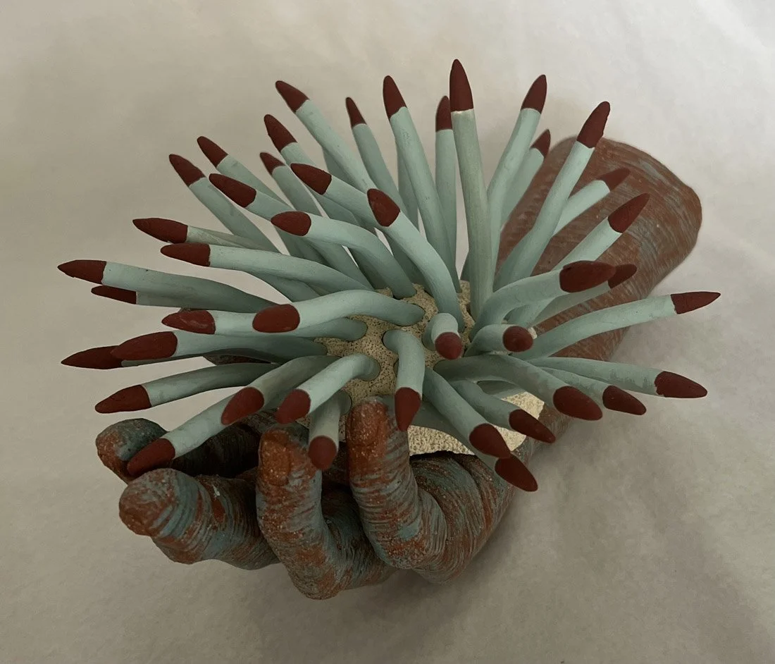 "In Your Hands 7" 2024, clay, matte underglazes  (6 x 10 x 7")