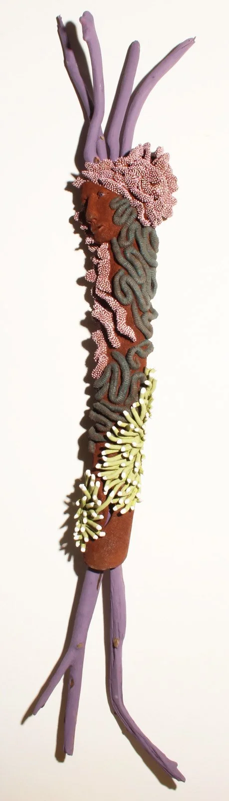 "Coralized 16" 2019, clay, matte underglazes, driftwood (42 x 10 x 5”)