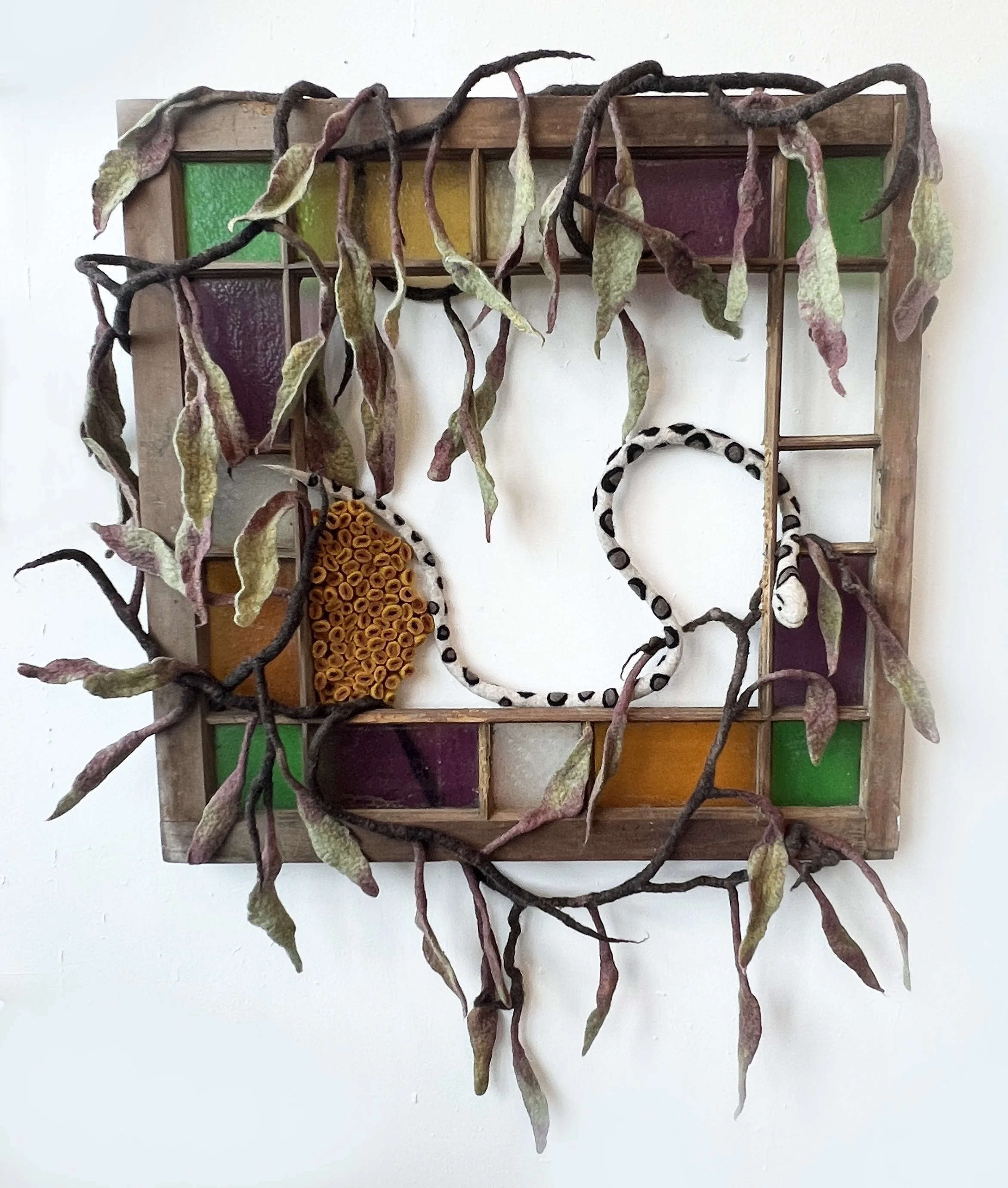 "So You Want to Restore a Cabin in the Woods"   2025, wool roving, salvaged window (35 x 44 x 6")