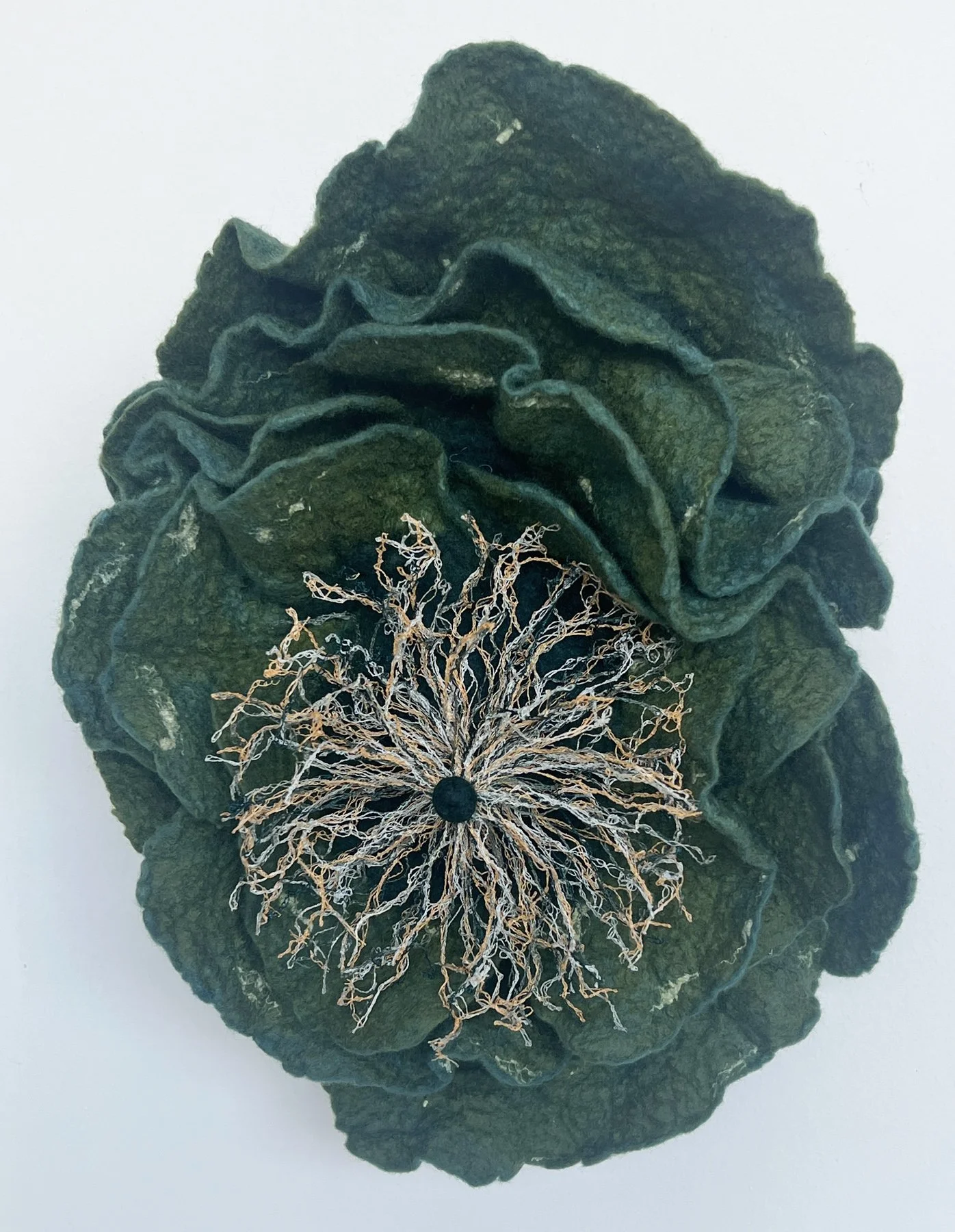 "Sea Scroll" 2025, wool roving, embroidery thread (14 x 10 x 4")