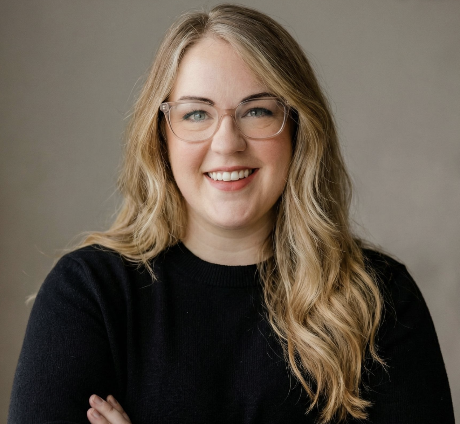 Kassandra Smalley, Registered Psychotherapist (Qualifying), smiling professional headshot at Watkins Counseling and Wellness