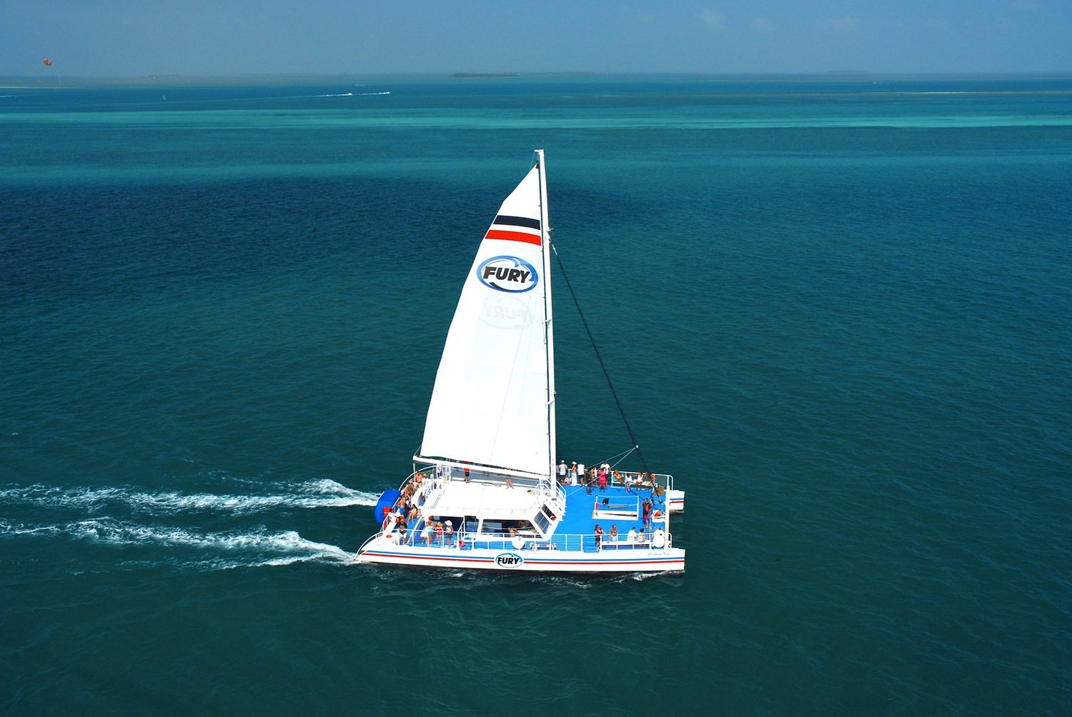 Fury catamaran sailing off Key West