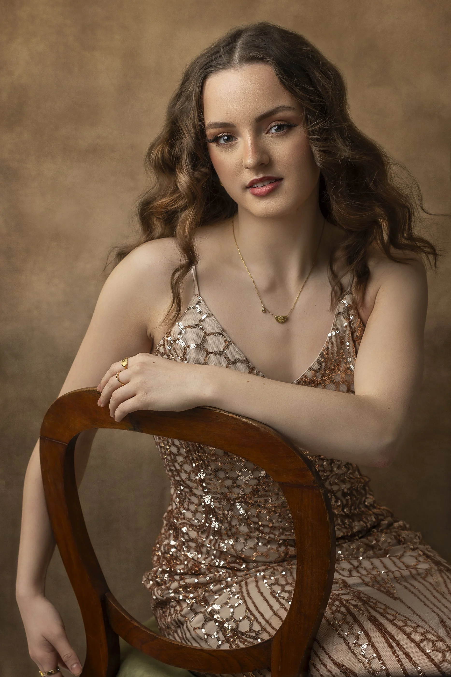 Girl-on-chair-seated-pose