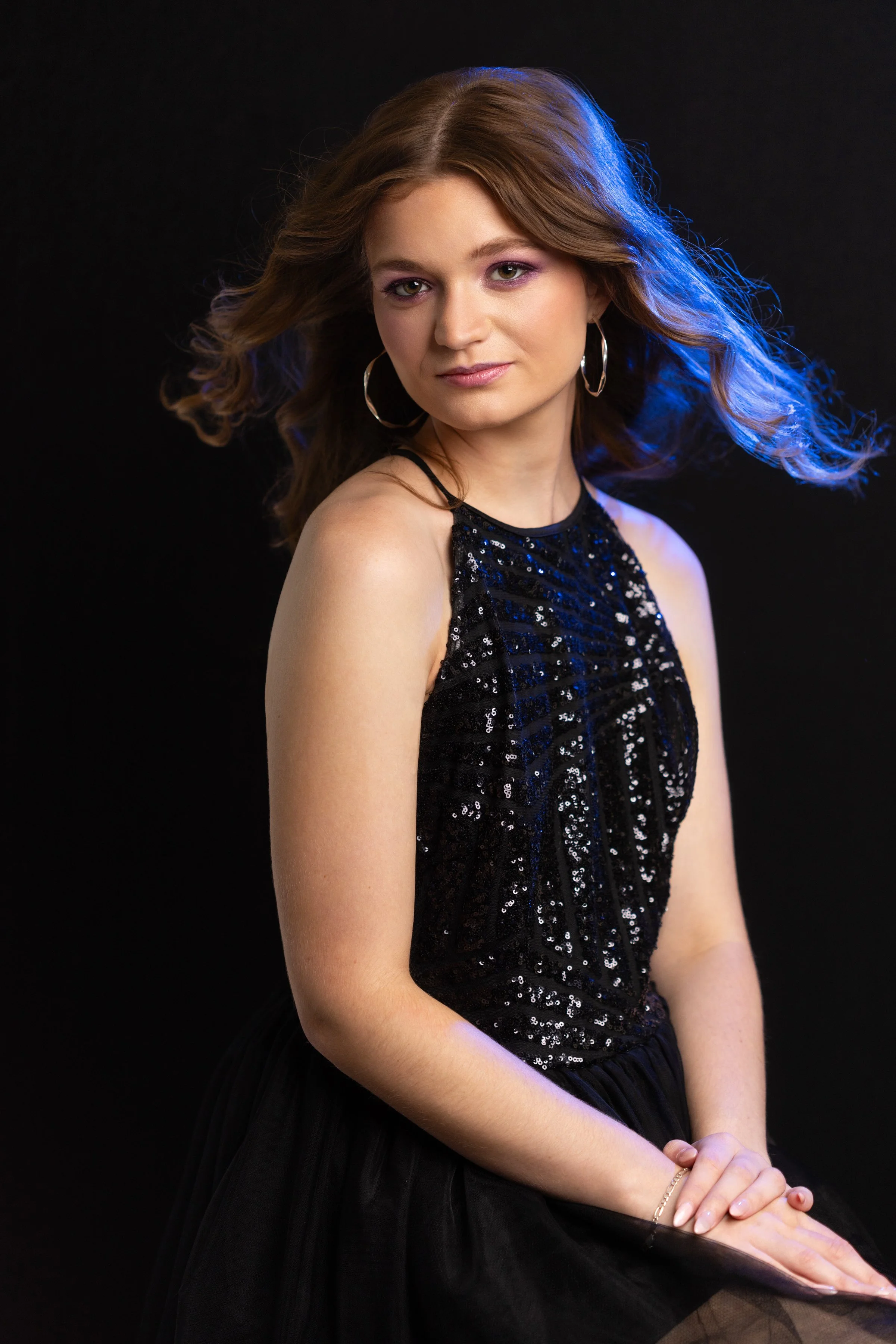 Studio Image of Girl with blue light in hair
