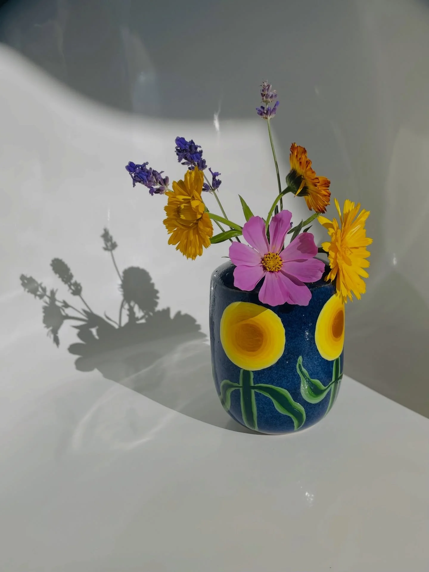 I finished revamping this beautifully crafted vase this week. It looks so happy in the sunshine full of blooms from my garden. 

#sunshinyday #happyvaseshappyflowers #brightlight #handpaintedvase #troubleandstrifeceramics