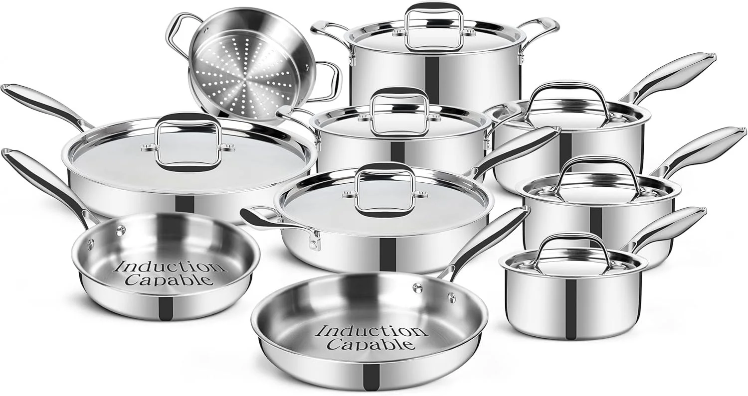 Set of stainless steel pots and pans of various sizes, some with lids, on a white background.