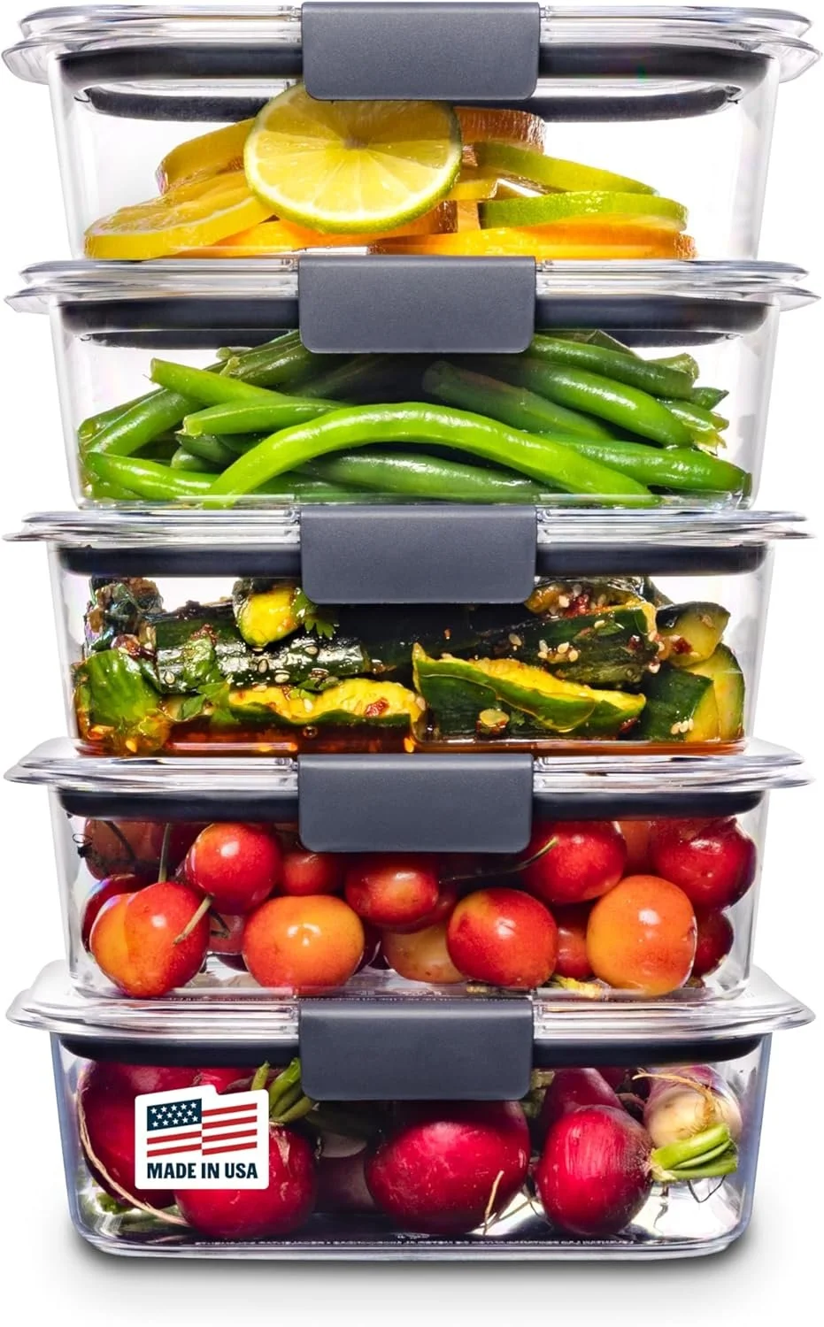 Stacked glass food storage containers filled with sliced lemon, green beans, cucumber salad, cherry tomatoes, and red onions.