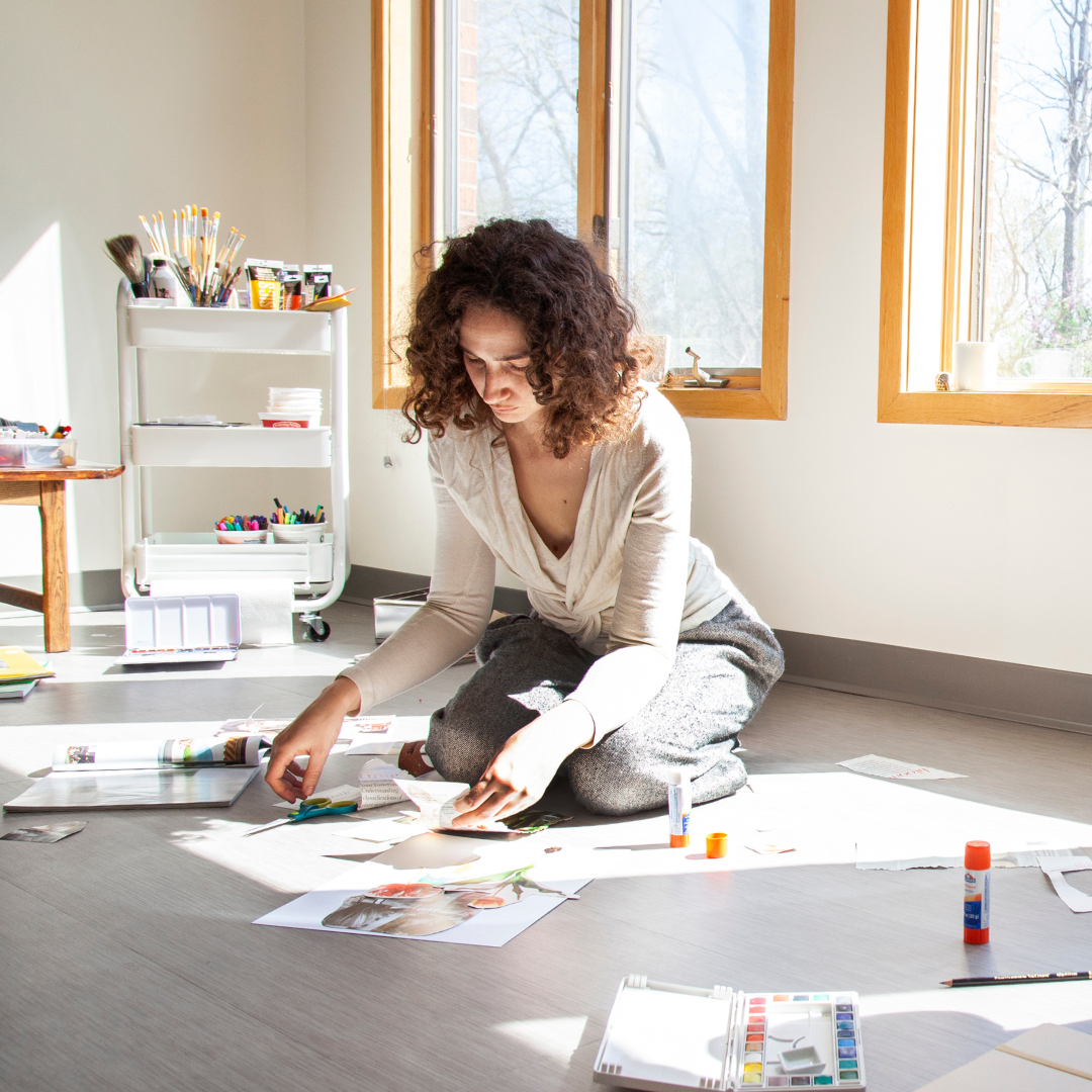Woman being creative on the floor