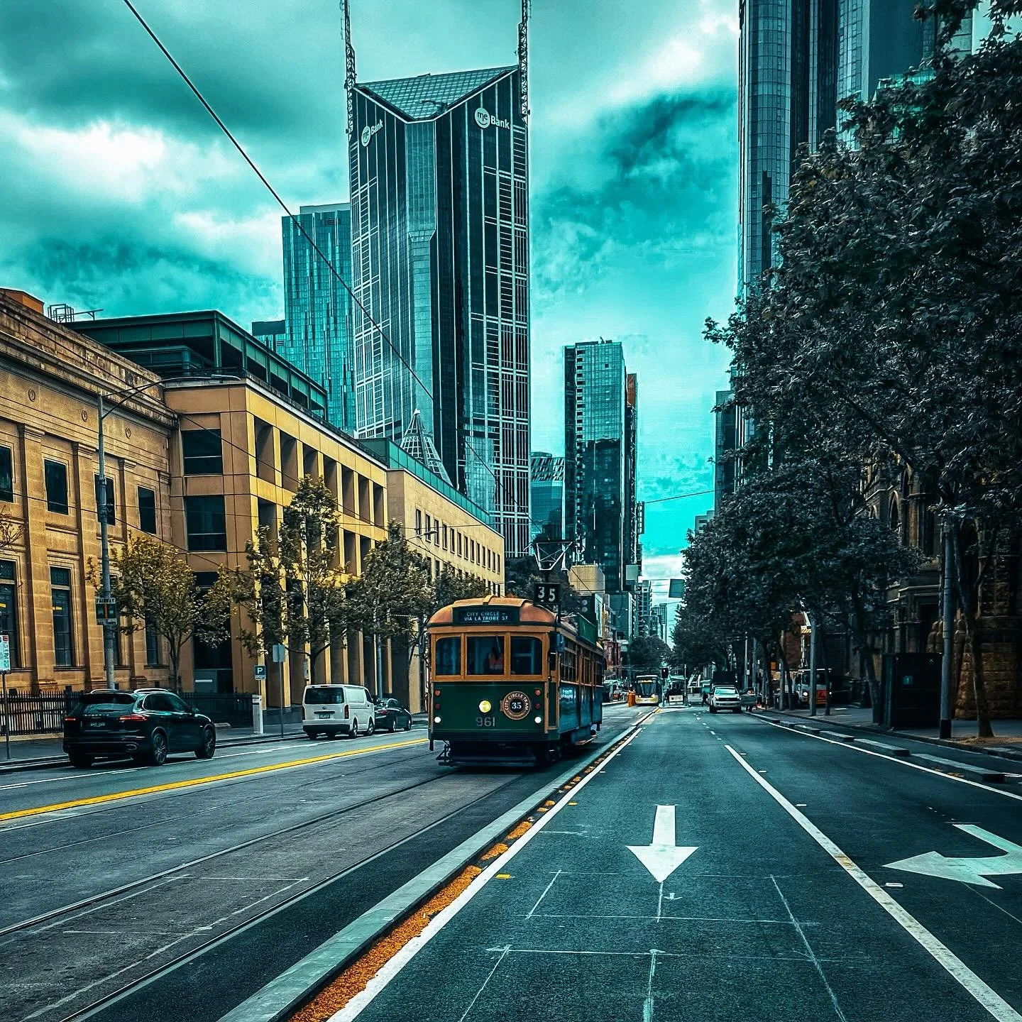 Melbourne hums &mdash; trams and towers, memory and motion. A city that never sits still.

#MelbourneThroughMyEyes #CityOfContrasts #UrbanPoetry #StreetStories #SkylineAndSoul