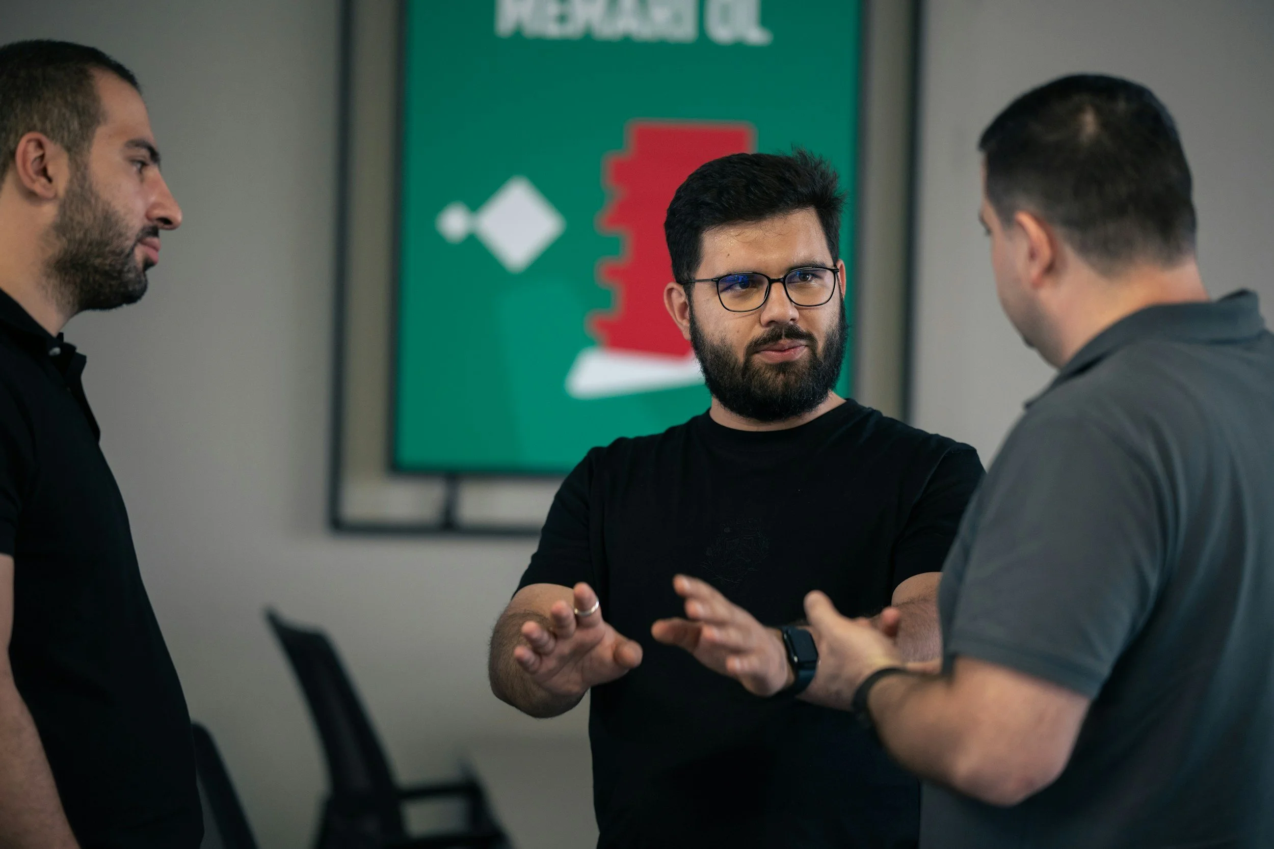 Image of two person discussing about ai butterfly