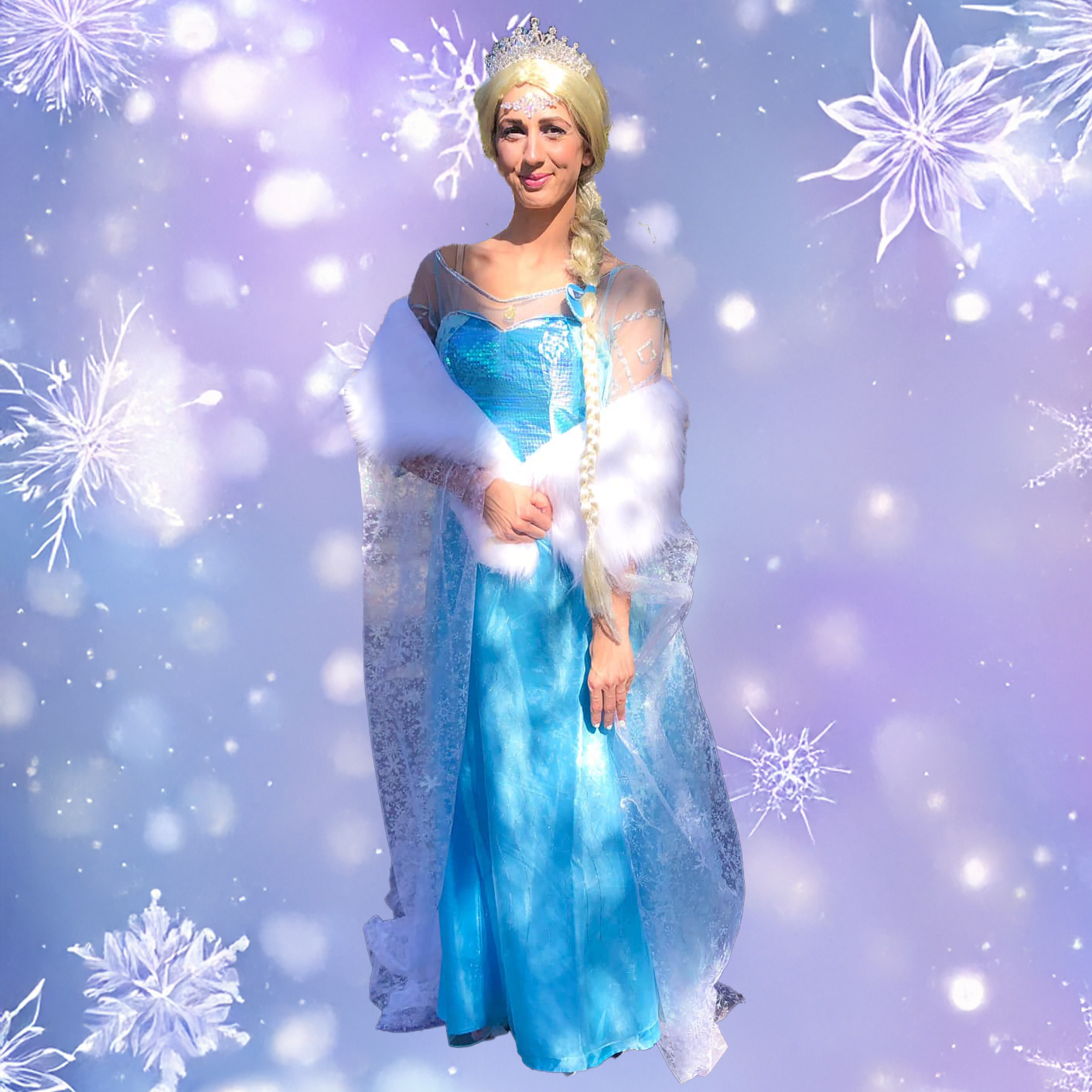 Woman dressed as Elsa from Frozen, wearing a blue gown with icy accents and a tiara, standing against a backdrop of snowflakes and icy patterns.