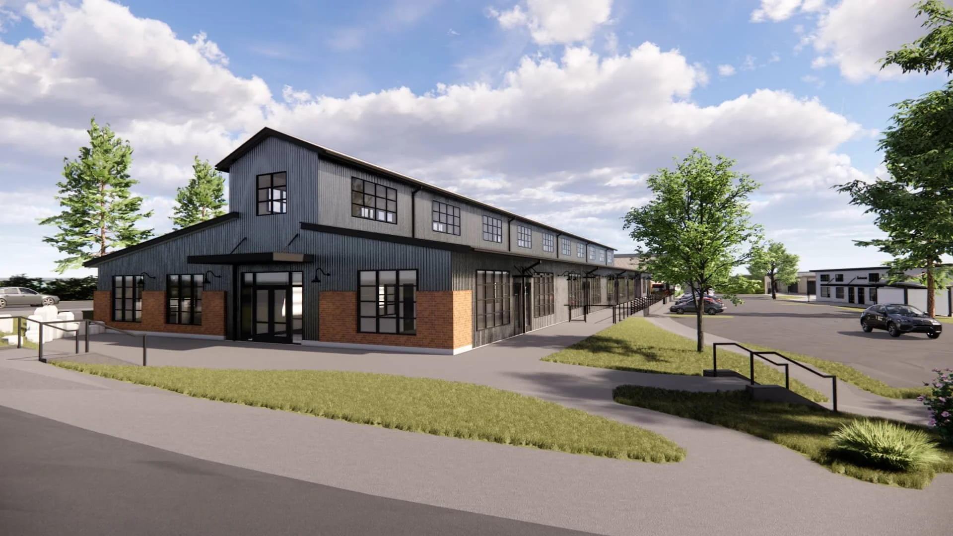 Front view of a modern two-story house painted dark gray with large windows, a garage, and a landscaped front yard with small bushes, flowers, rocks, and a concrete walkway.