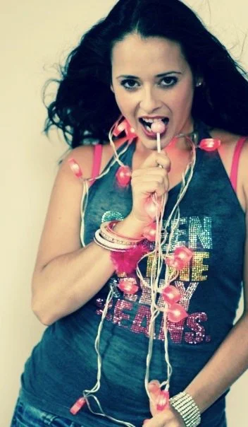Lolly music promo photo, iconic 90s pop star recognized for upbeat dance tracks and youthful vibe.