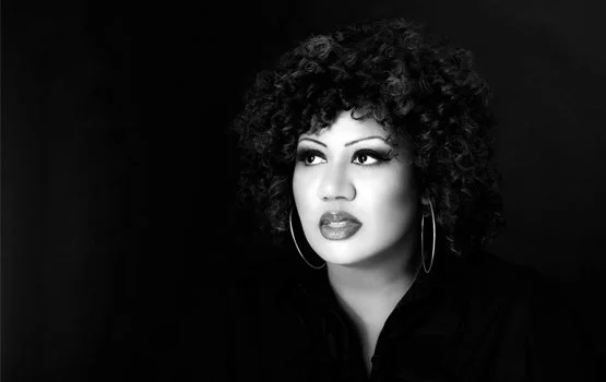 90s dance vocalist Simone Denny delivering a powerful live performance with Love Inc.