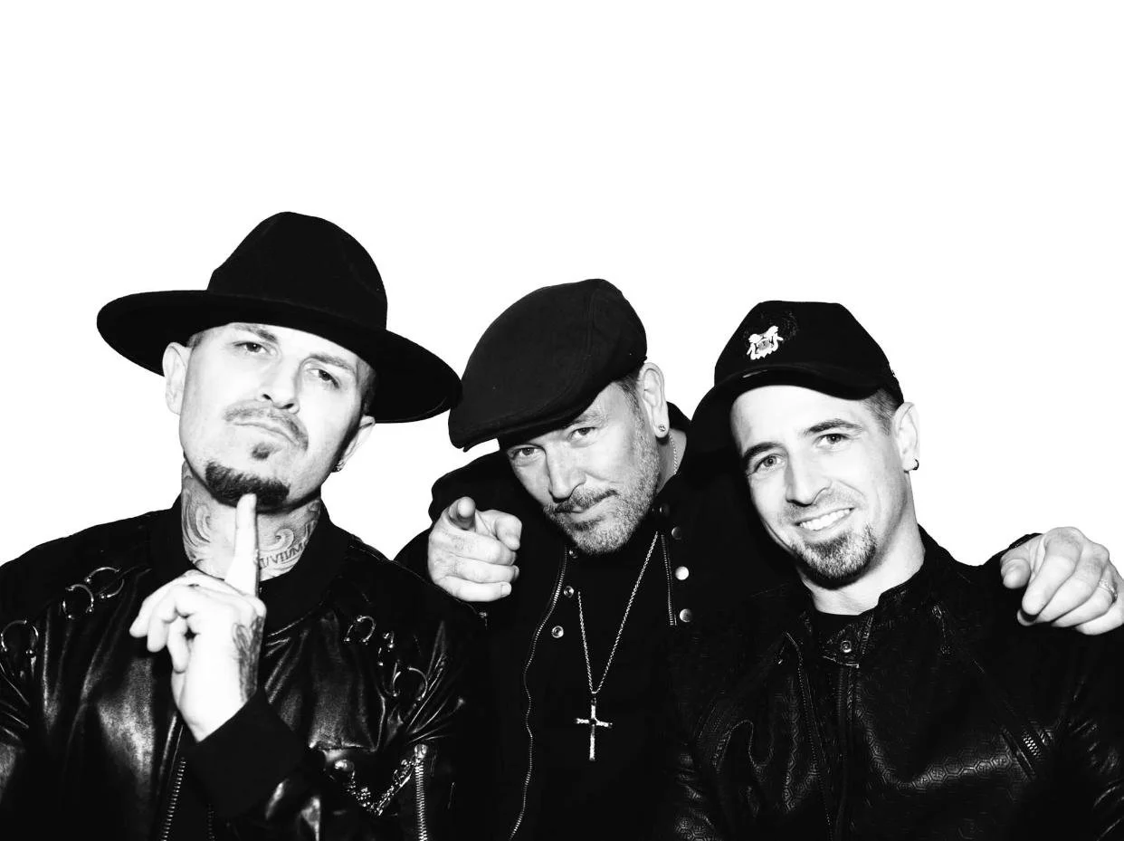 East 17 in a professional promo shoot, classic 90s pop group with a strong fanbase and memorable singles like “Stay Another Day.”