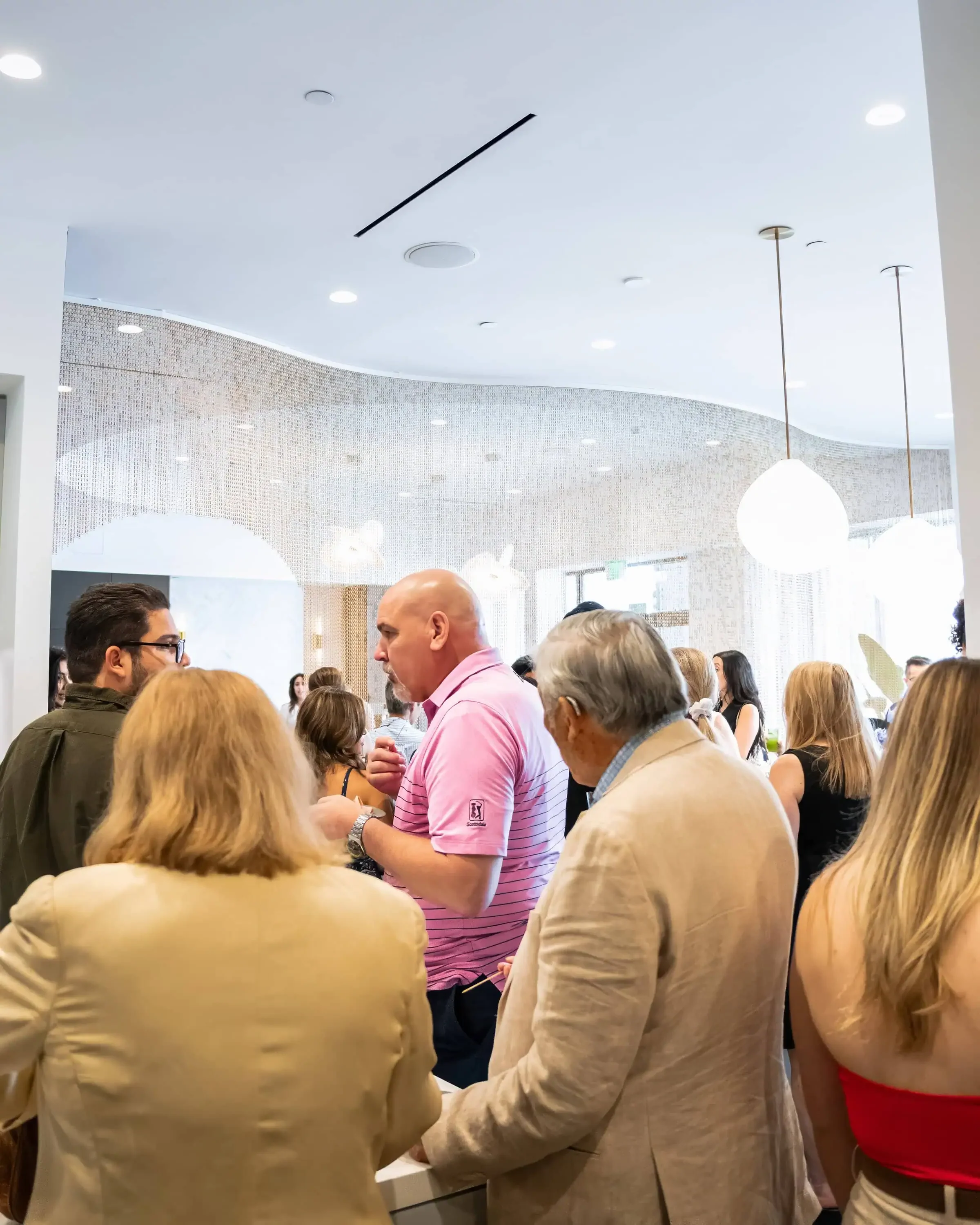 Corporate event photography being done at a grand opening event in Houston.