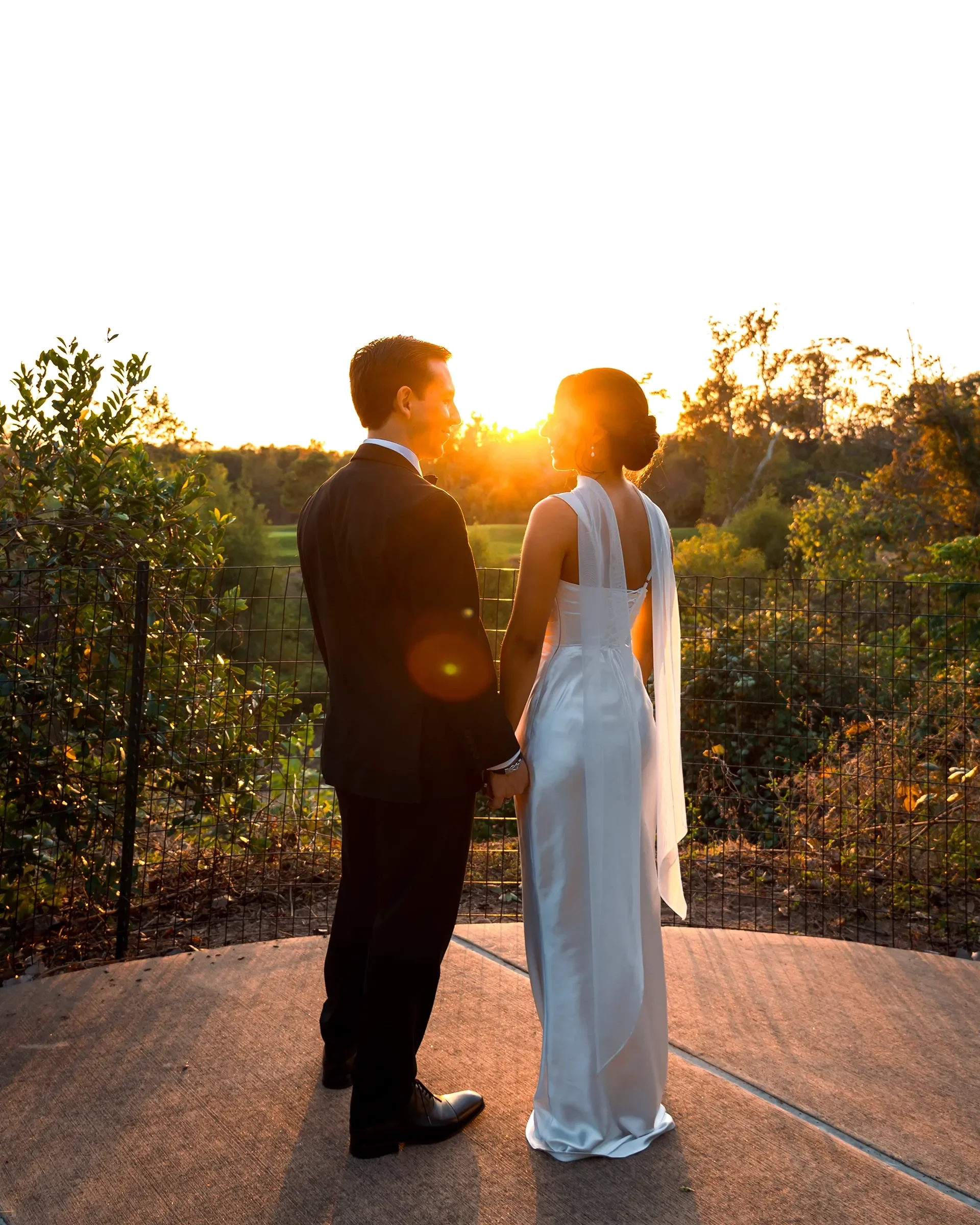 Engaged couple at the Botanic Garden during golden hour, photographed by a Houston engagement photographer