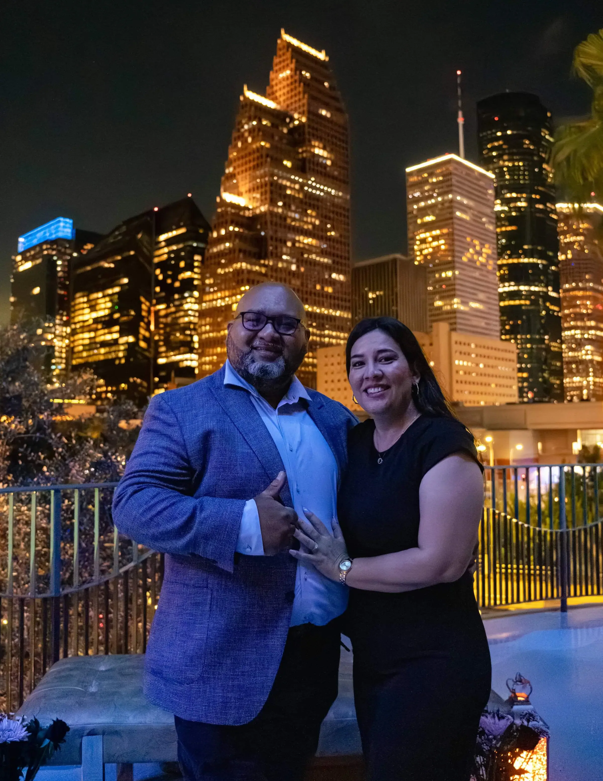 Nighttime Photograph of a newly engaged couple from an Engagement Photographer
