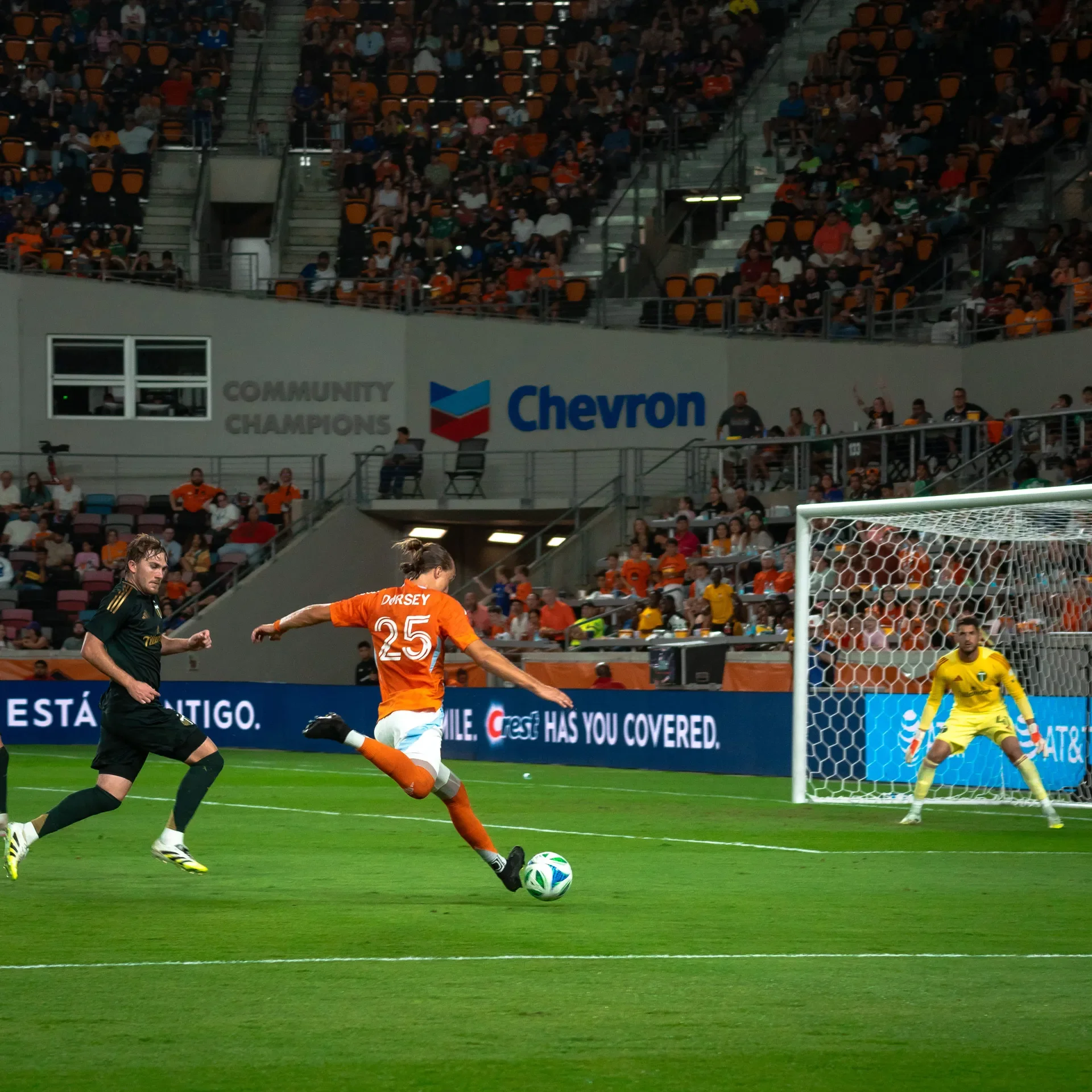 Dorsey from the Houston Dynamo taking a shot at the goal. A critical moment in Sports Photography as it could be the shot that can be super valuable.