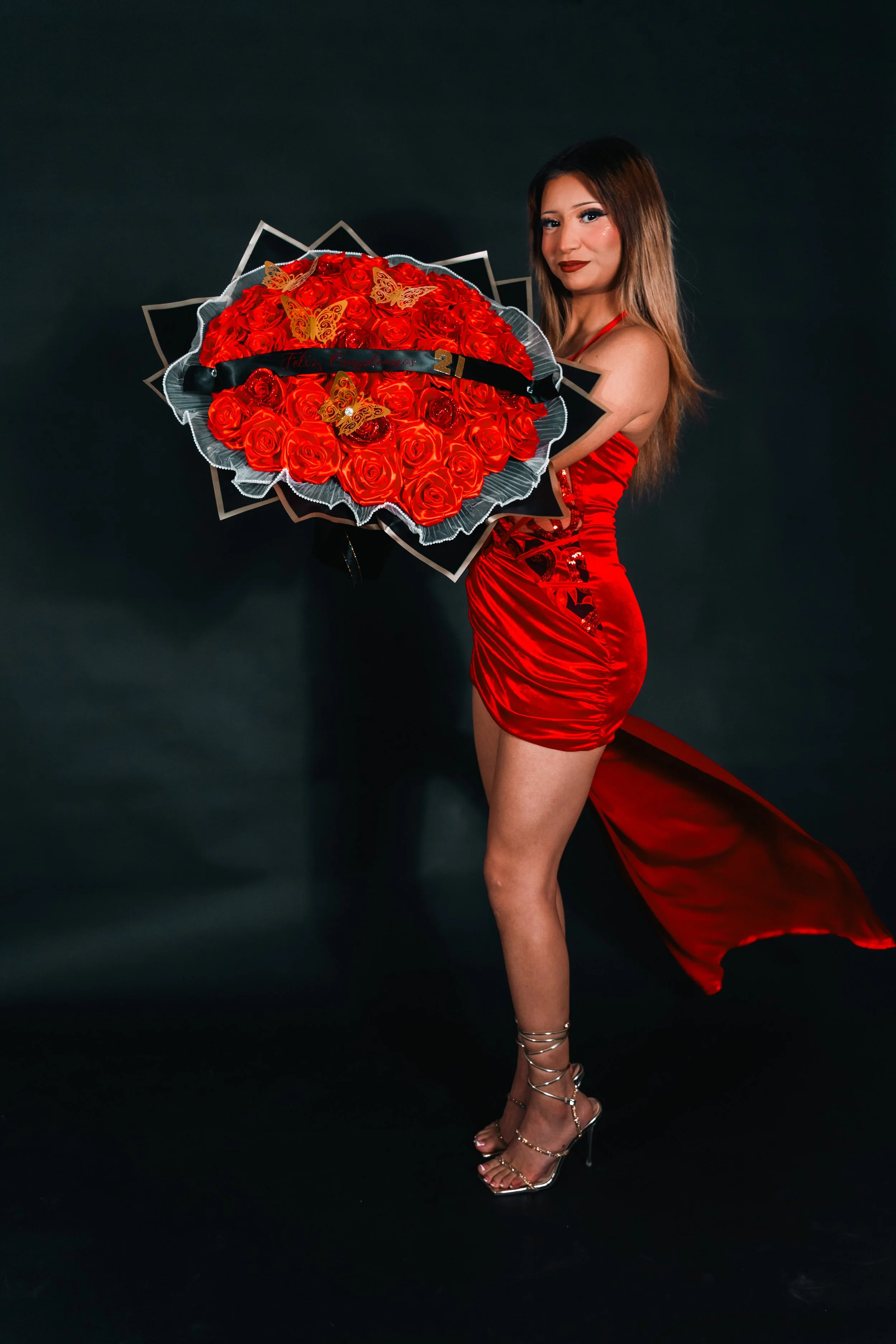 A Birthday Personal Shoot with a girl with roses and a red dress