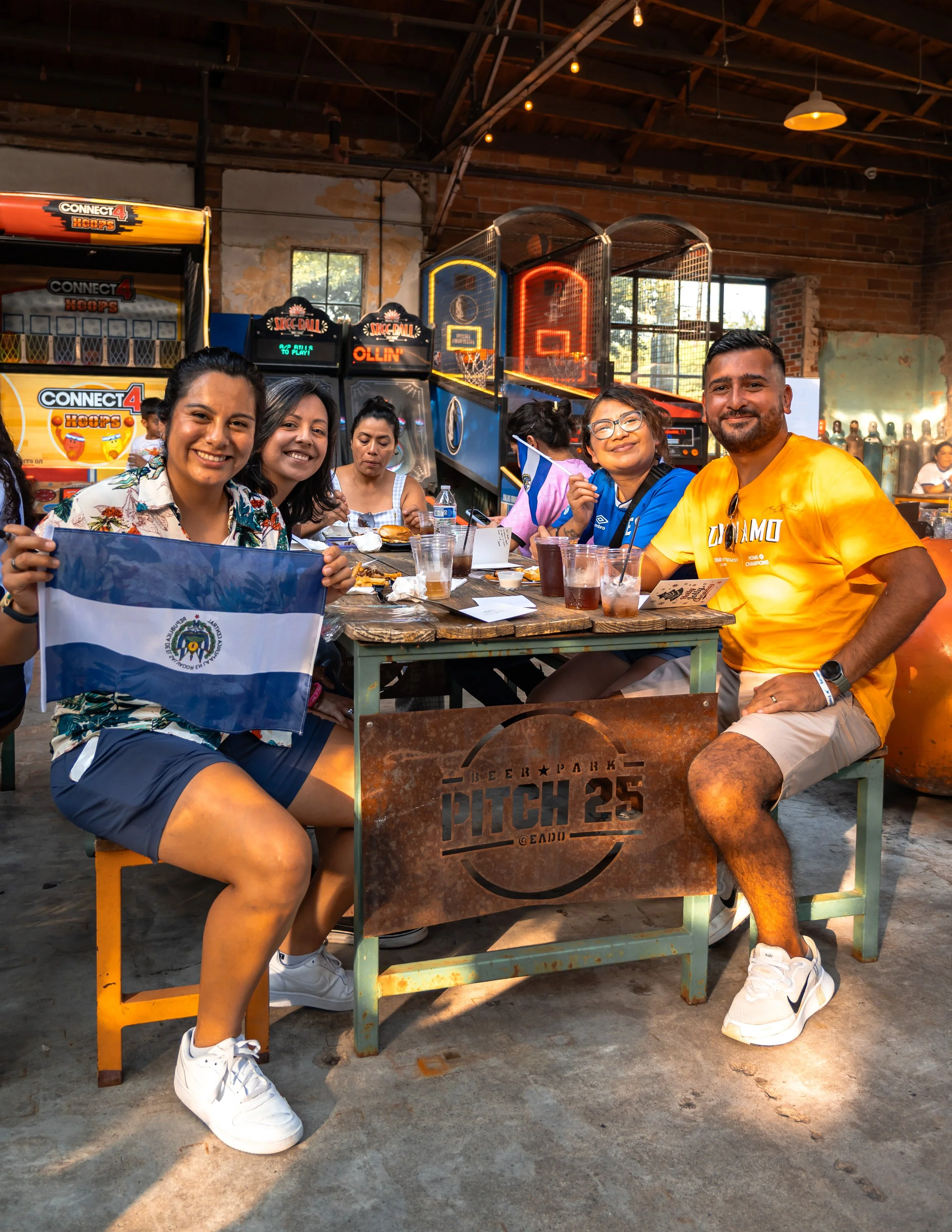 A group of people getting their photo taken by an event photographer in Houston.