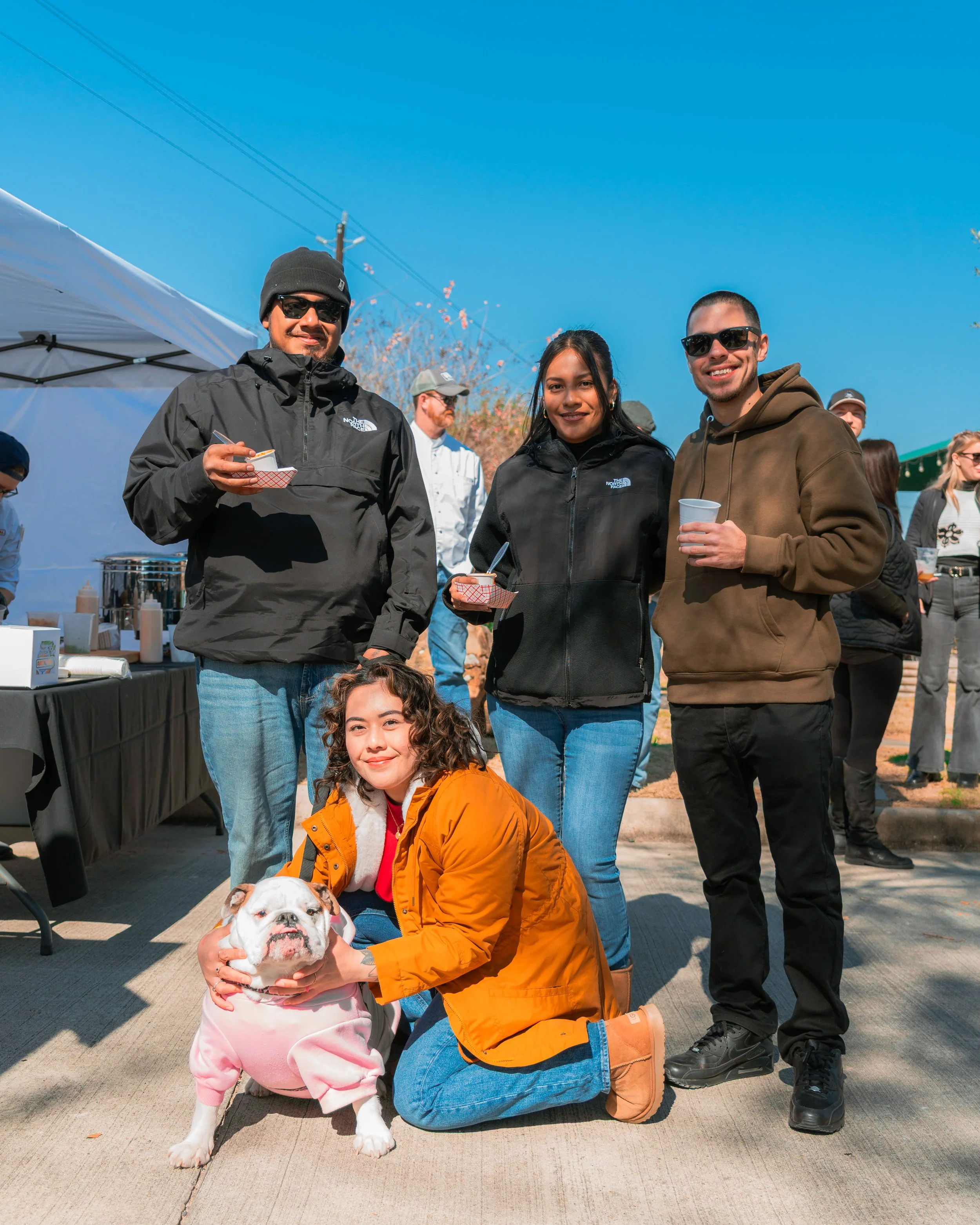 A group of chili enthusiasts getting their photo taken by a Houston event photographer.